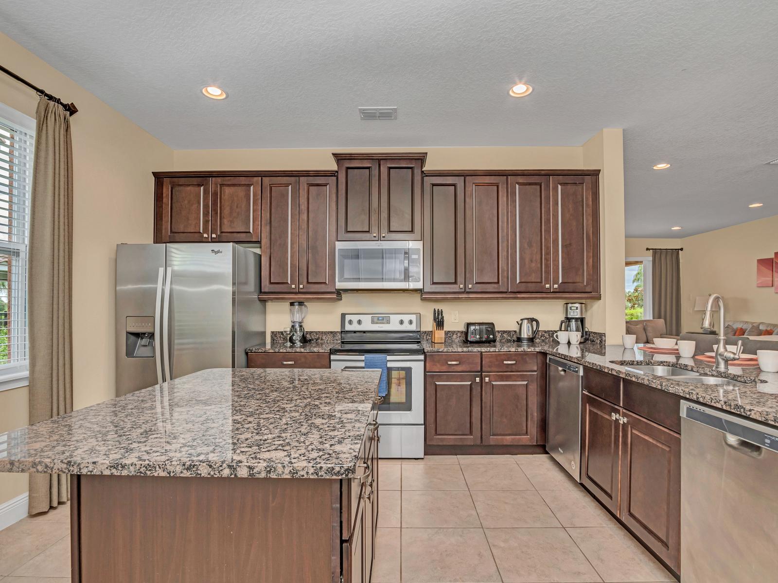 Chic Kitchen of the Home in Kissimmee Florida - A spacious layout and ergonomic design for maximum efficiency - A sleek, modern aesthetic that's both practical and stylish - Plenty of storage