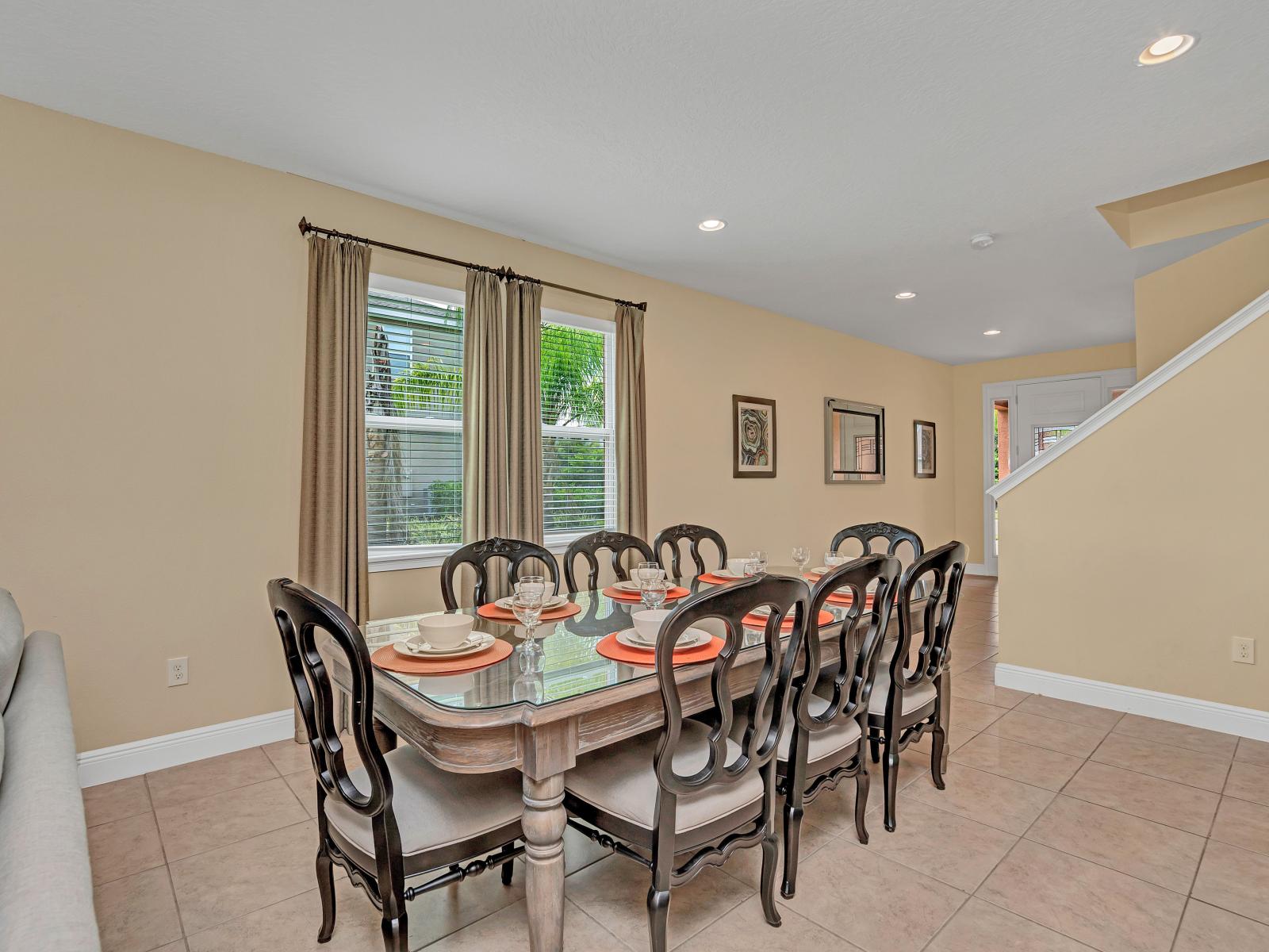 Luxe Dining Area of the Home in Kissimmee Florida - Elegant 8-seater dining table  - Embrace the joy of shared feasts and lasting bonds - Dedicated dining area with a chic table