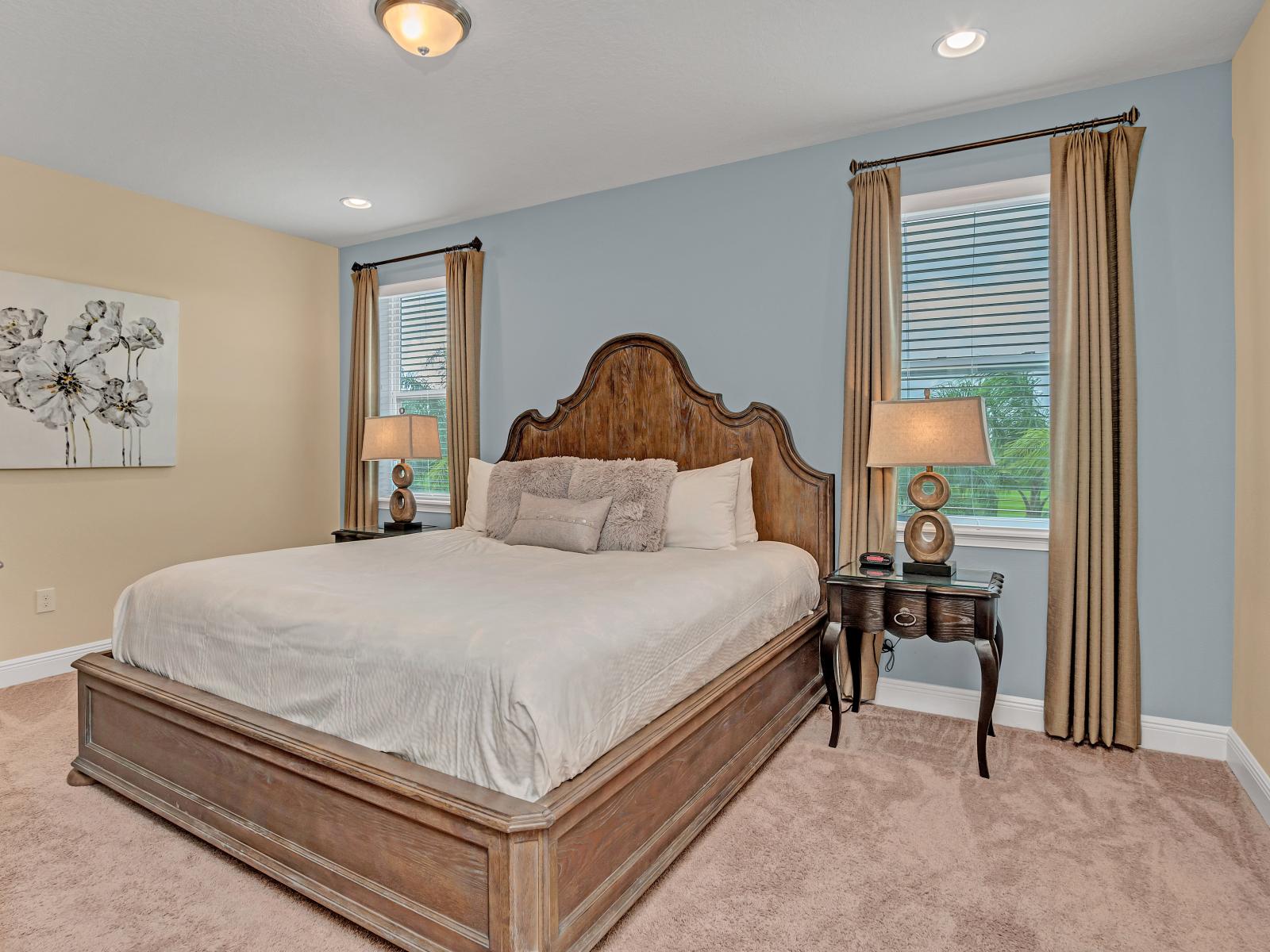 Pristine bedroom of the Home in Kissimmee Florida - Purity meets tranquility, creating a serene oasis for rest and rejuvenation - Embrace the calm ambiance of this elegant retreat with double bed