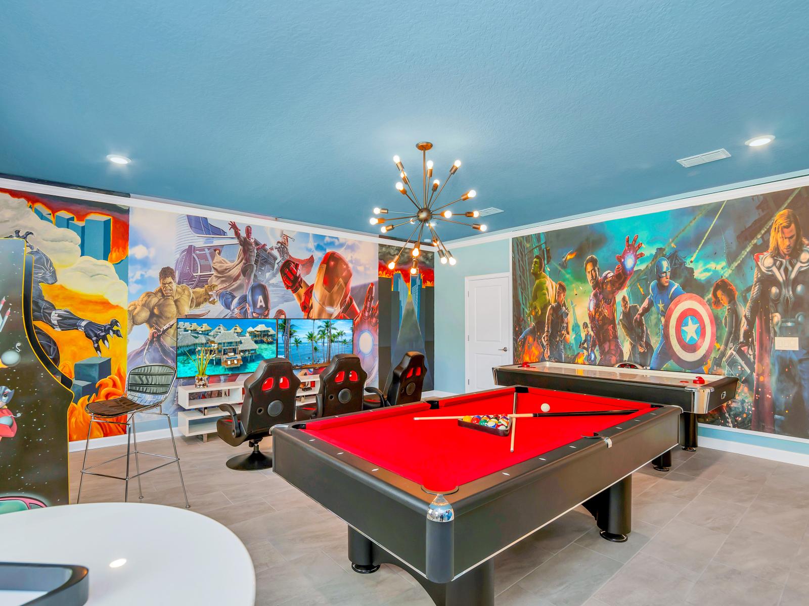 Game Room of the Home in Reunion Florida - From heroic decor to exciting game options - A space where everyone can unleash their inner superheroes  - Create lasting memories