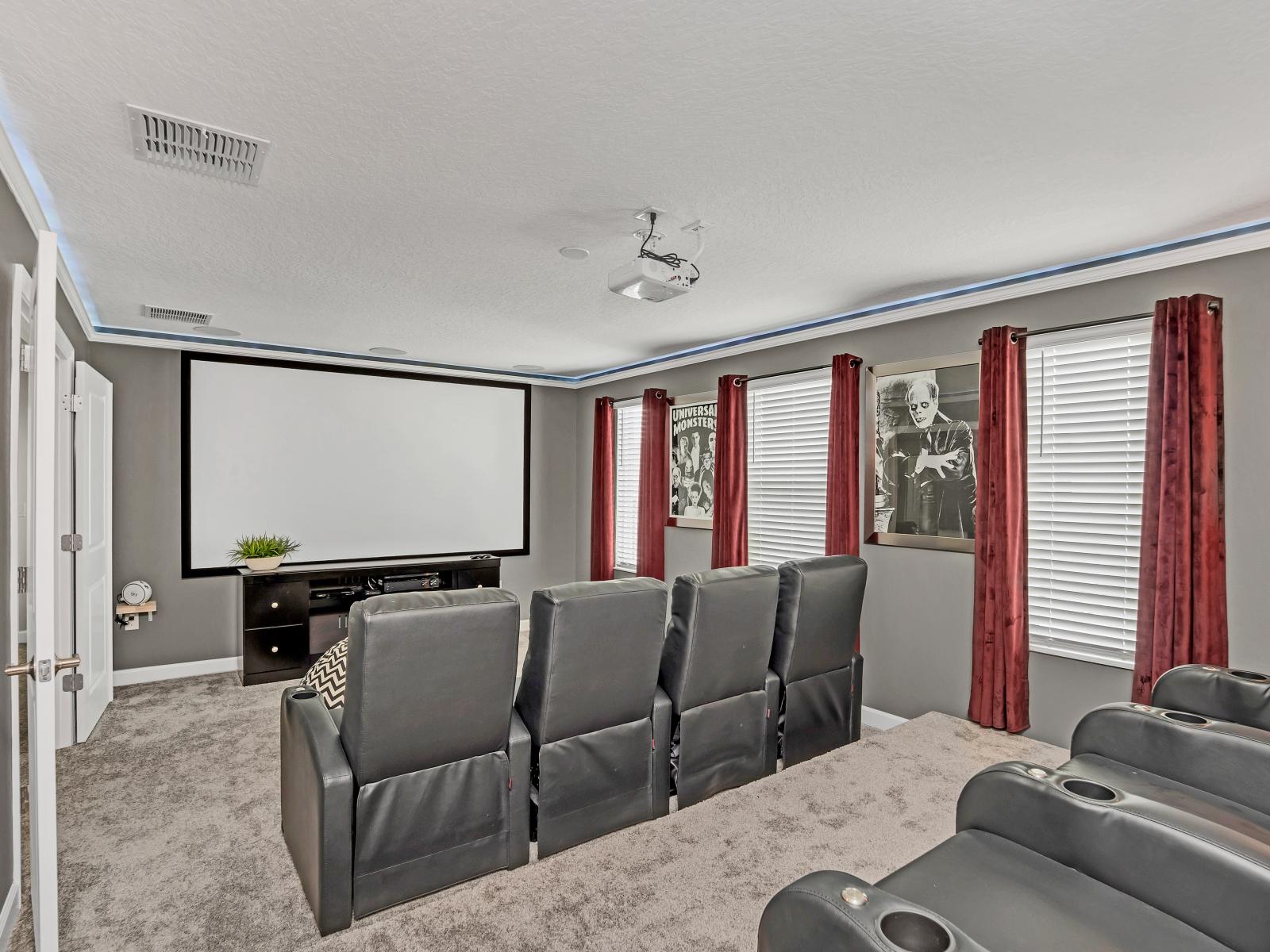 The entertainment room  is a vibrant hub of fun and excitement. With a variety of amenities including games, movies, and more, it's the perfect space for guests to gather, unwind, and create lasting memories together.