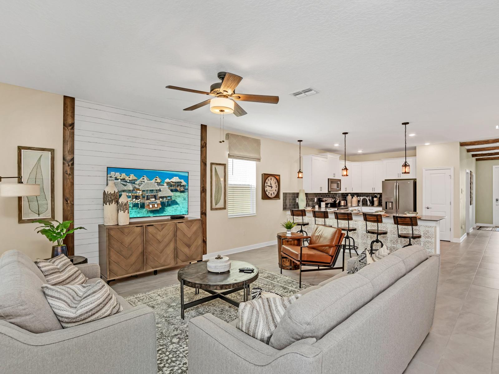 Spacious Living Area of the Home in Reunion Florida - Offers comfort and style - With plush furnishings and a welcoming ambiance - Smart TV and Netflix