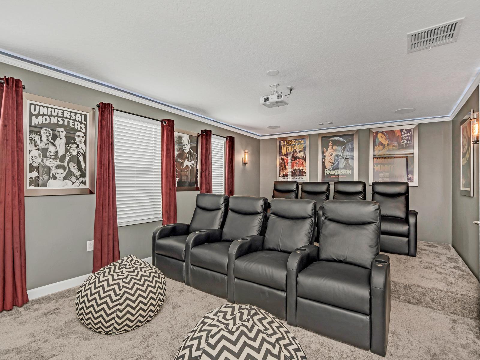 Theater room of the Home in Reunion Florida - Immerse yourself in movie theater room - Complete with a collection of comfortable sofas for an unforgettable cinematic experience - Enjoy your favorite movies with family and loved ones