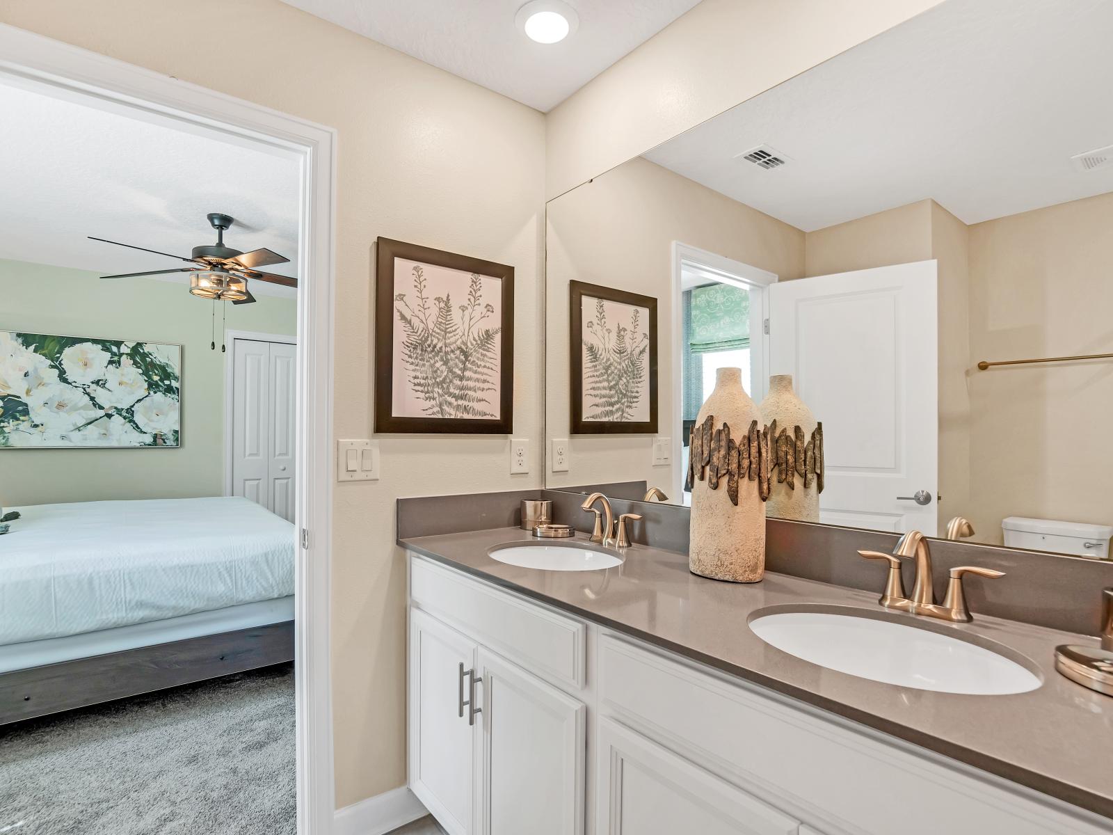 With contemporary design elements, ample storage, and elegant fixtures, it provides a luxurious space where guests can pamper themselves in style.