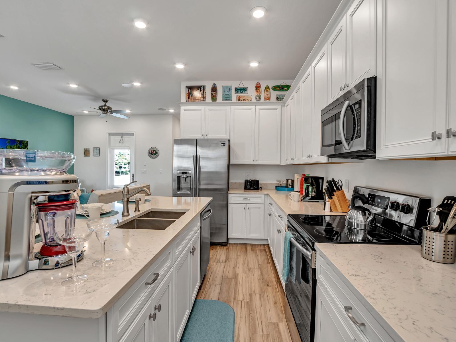 Modern kitchen of the cottage in Kissimmee Florida - Stainless steel appliances - Fully Equipped kitchen - Let your cooking adventures begin!