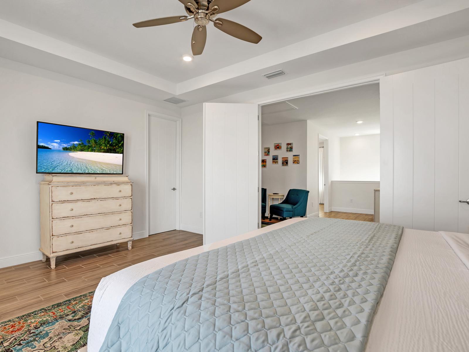 Serene Sophistication: Experience Tranquility in Our Master Bedroom, Adorned with Crisp White Décor, Offering a Refreshing and Relaxing Retreat.