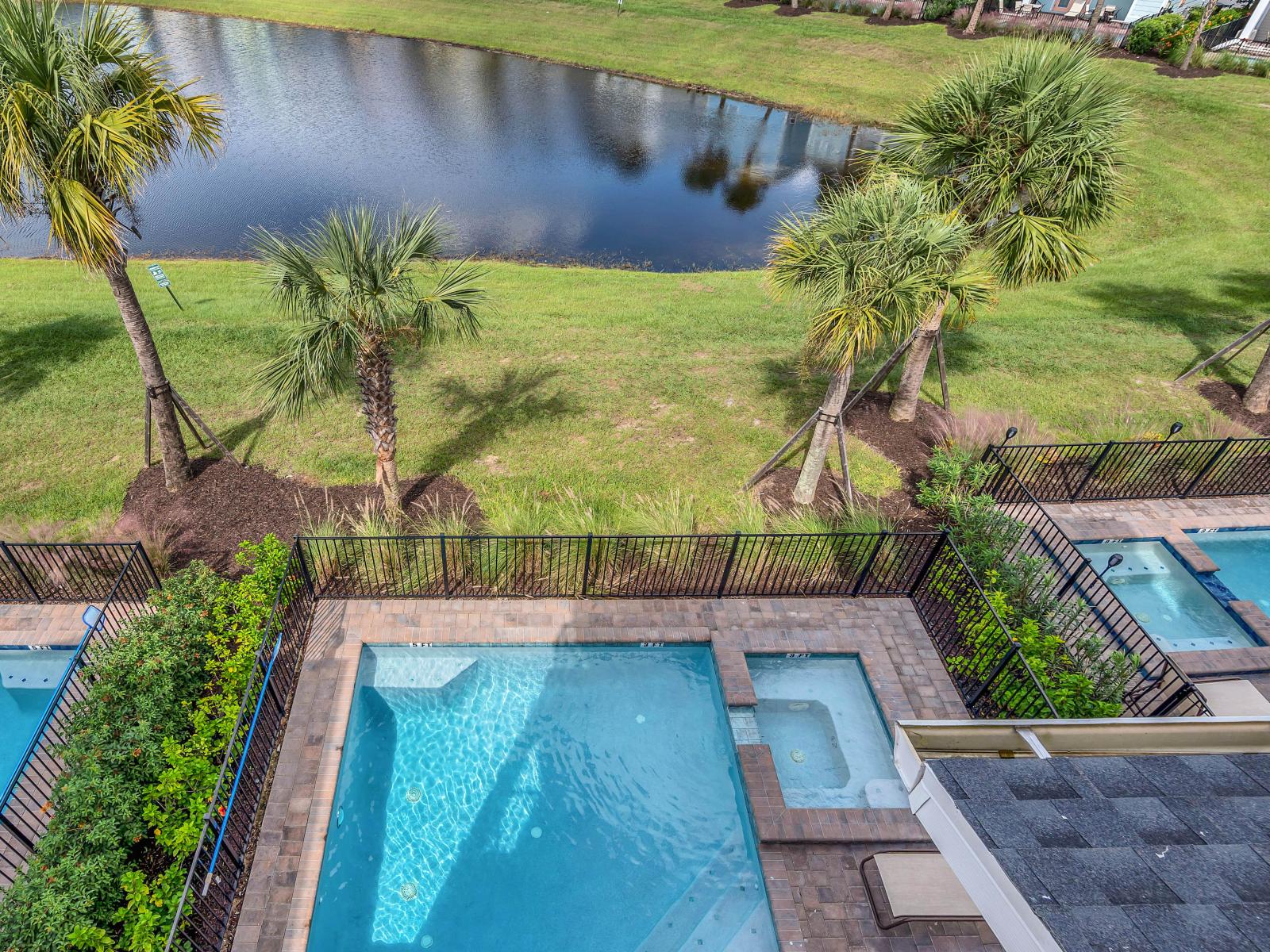 Sun-soaked Elegance: Bask in the glory of our outdoor swimming pool, where every moment is a picture-perfect escape, complemented by cozy lounge chairs for your utmost comfort.