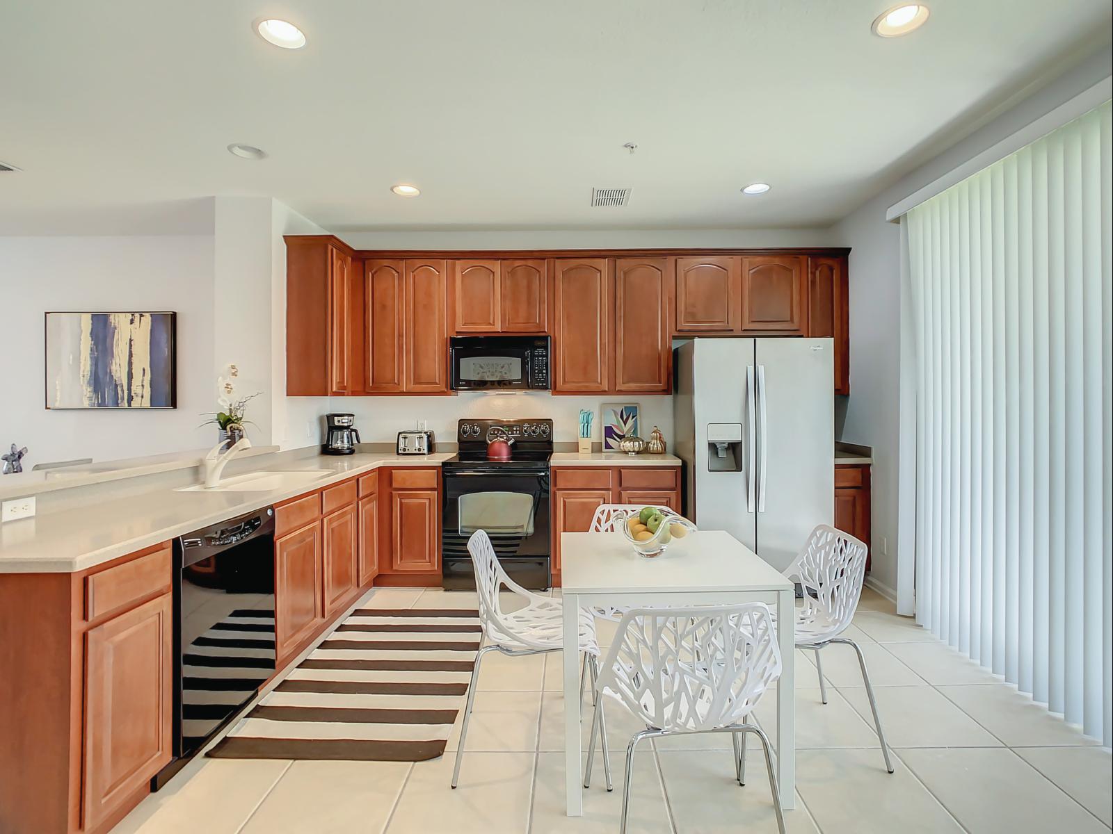 Effortless Cooking: Enjoy the fully equipped kitchen with an open-concept design, flooded with natural light from the outside, creating an inviting ambiance for meal preparation.