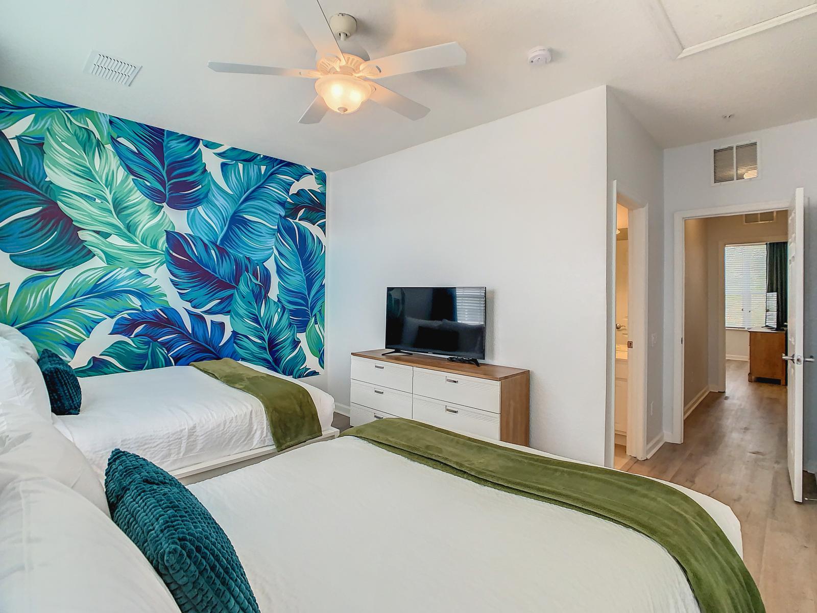 2nd bedroom: Immerse yourself in a serene tropical ambiance, perfect for unwinding and enjoying a peaceful stay away from the hustle and bustle.