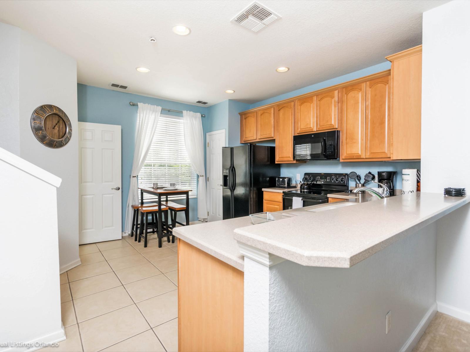 This stylish kitchen captures the essence of modern design, blending functionality and aesthetics seamlessly for a perfect cooking and gathering space.