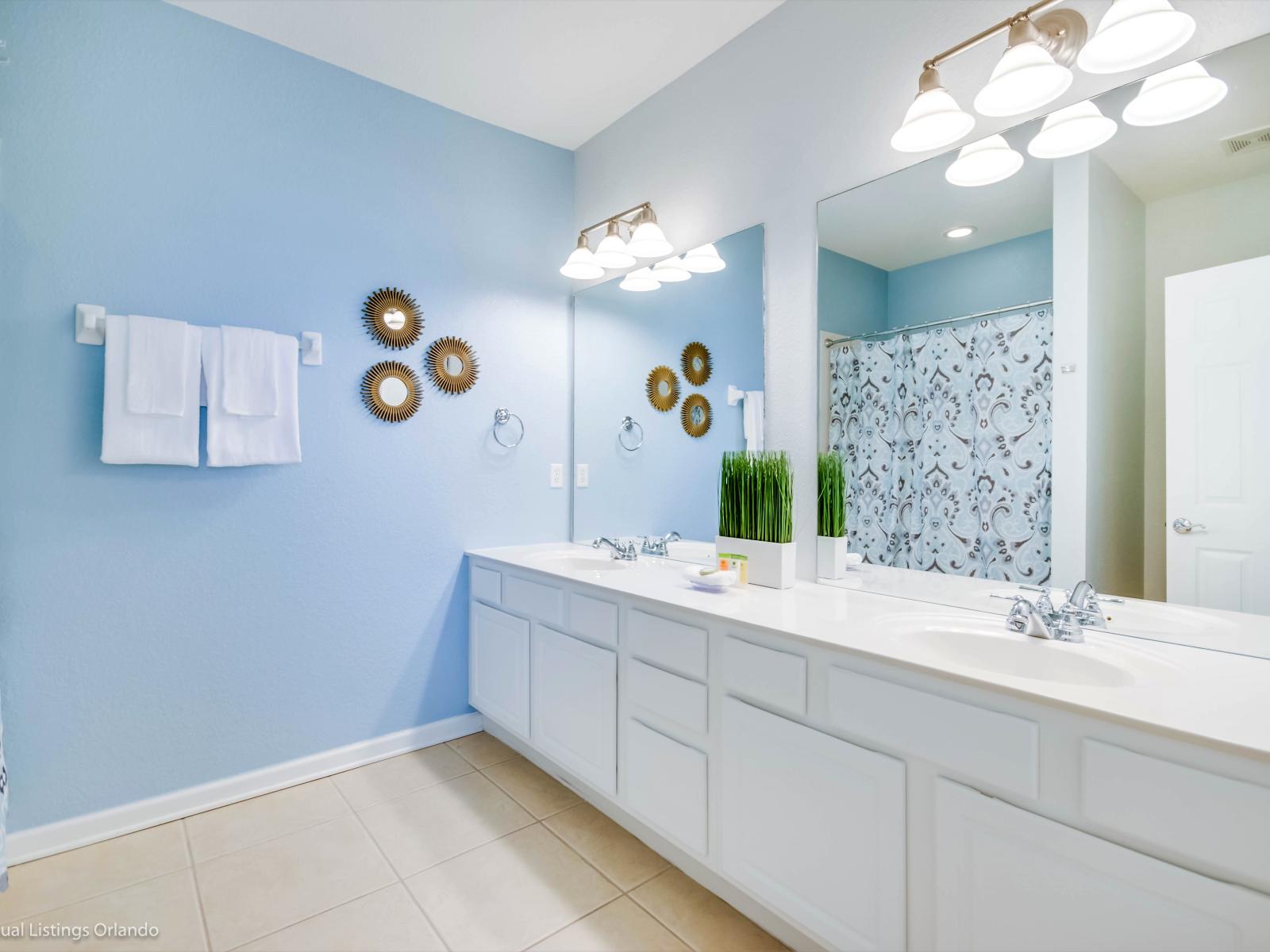 Indulge in luxury and convenience in our vanity area and bathroom. This stylish space is designed for your comfort, offering a perfect blend of functionality and elegance for your daily self-care routines.