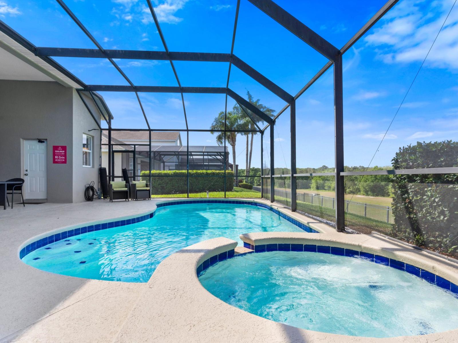 Private pool and spa  This outdoor space is perfect for grilling while watching the kids having fun in your own private swimming pool!