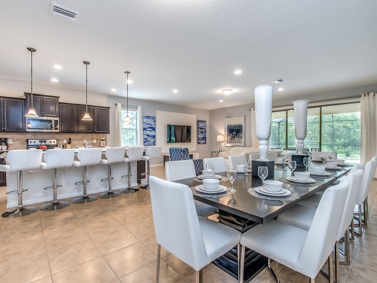 The dining and kitchen area harmonize to create a hub of culinary delight and social connection. Here, flavors mingle, conversations flow, and memories are savored in the heart of the home.