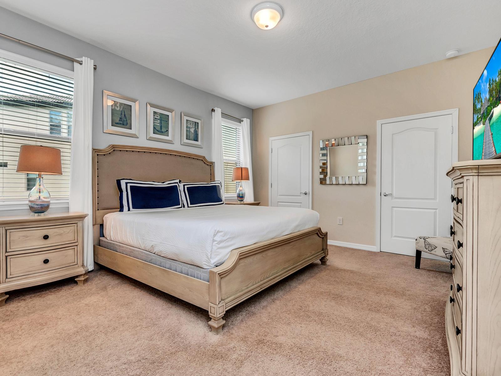 This bedroom exudes tranquility, offering a peaceful haven where rest and rejuvenation intertwine amidst elegant decor and soothing ambiance.