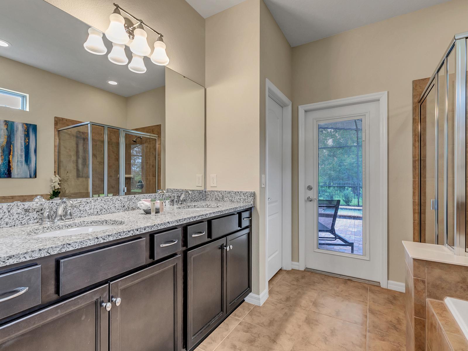 Refreshing Retreat: This toilet and bath, featuring a sleek shower enclosure, offers a refreshing retreat where modern design meets functionality, providing a rejuvenating space to start and end the day.