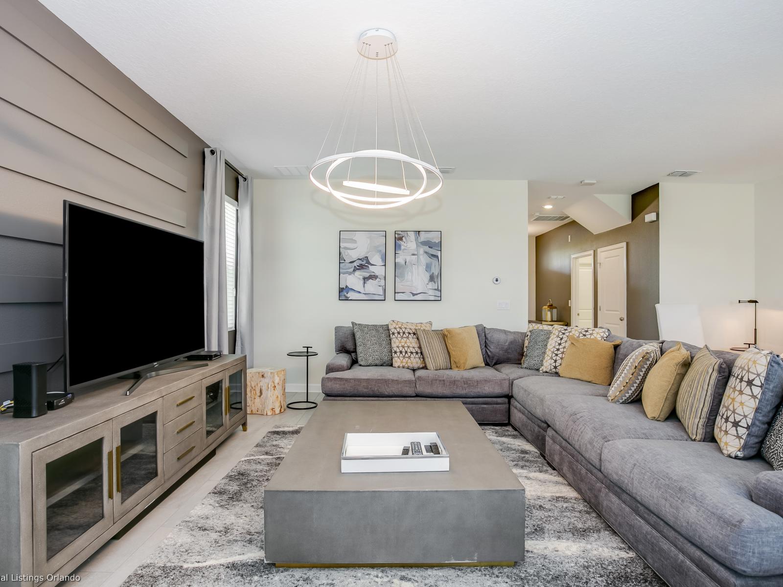 - Lush Living Area of the Home in Florida - Comfy sofa creates a warm and inviting space for relaxation and entertainment  - Smart TV and Netflix - Luxurious decor and lighting for a lavish ambiance