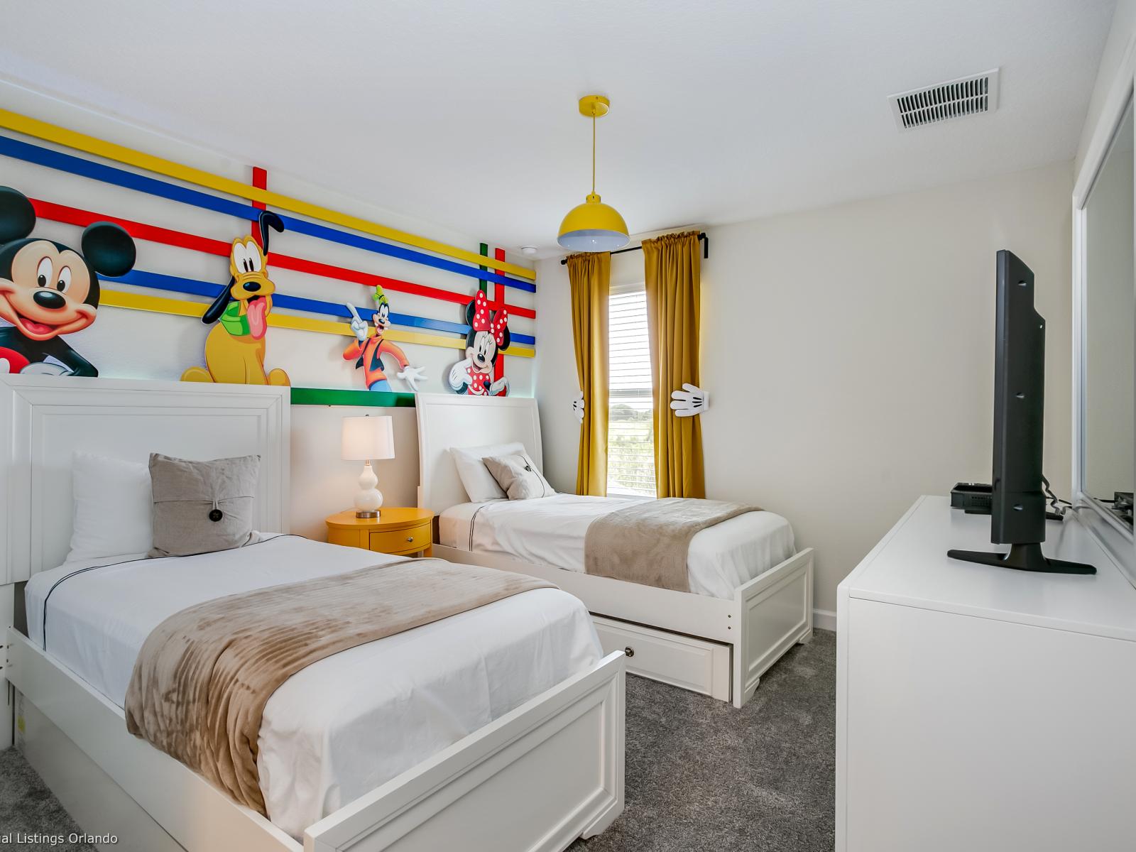 - Radiant Bedroom of the Home in Florida - Disney Themed two-bed bedroom is a whimsical wonderland that delights everyone - Adorned with beloved Disney characters and vibrant decor - Smart TV and Netflix