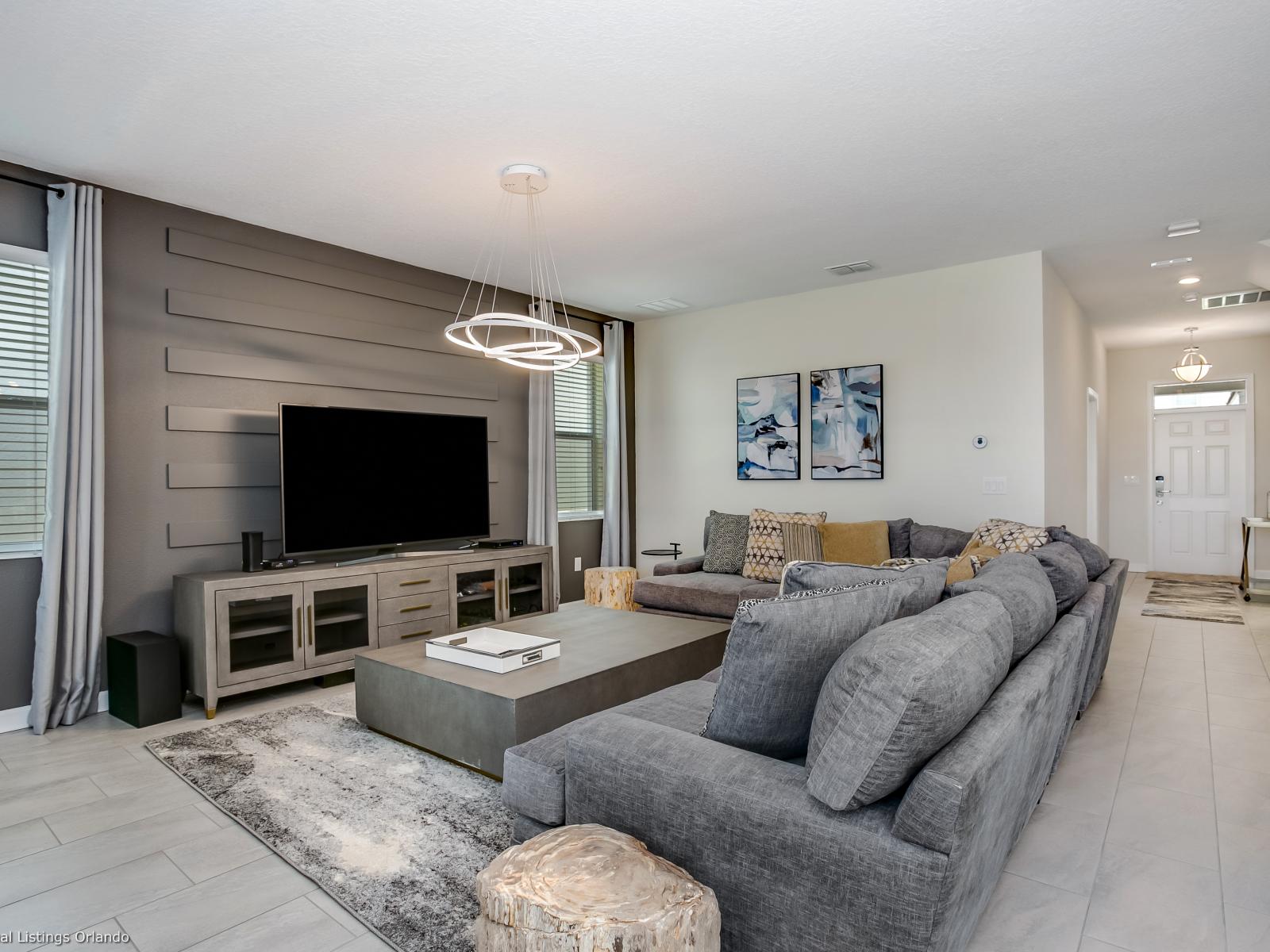 - Lavish Living Area of the Home in Florida - Smart TV and Netflix - Cozy seating area conducive to relaxation and socializing - Chic and contemporary living room design with clean lines and modern furnishings