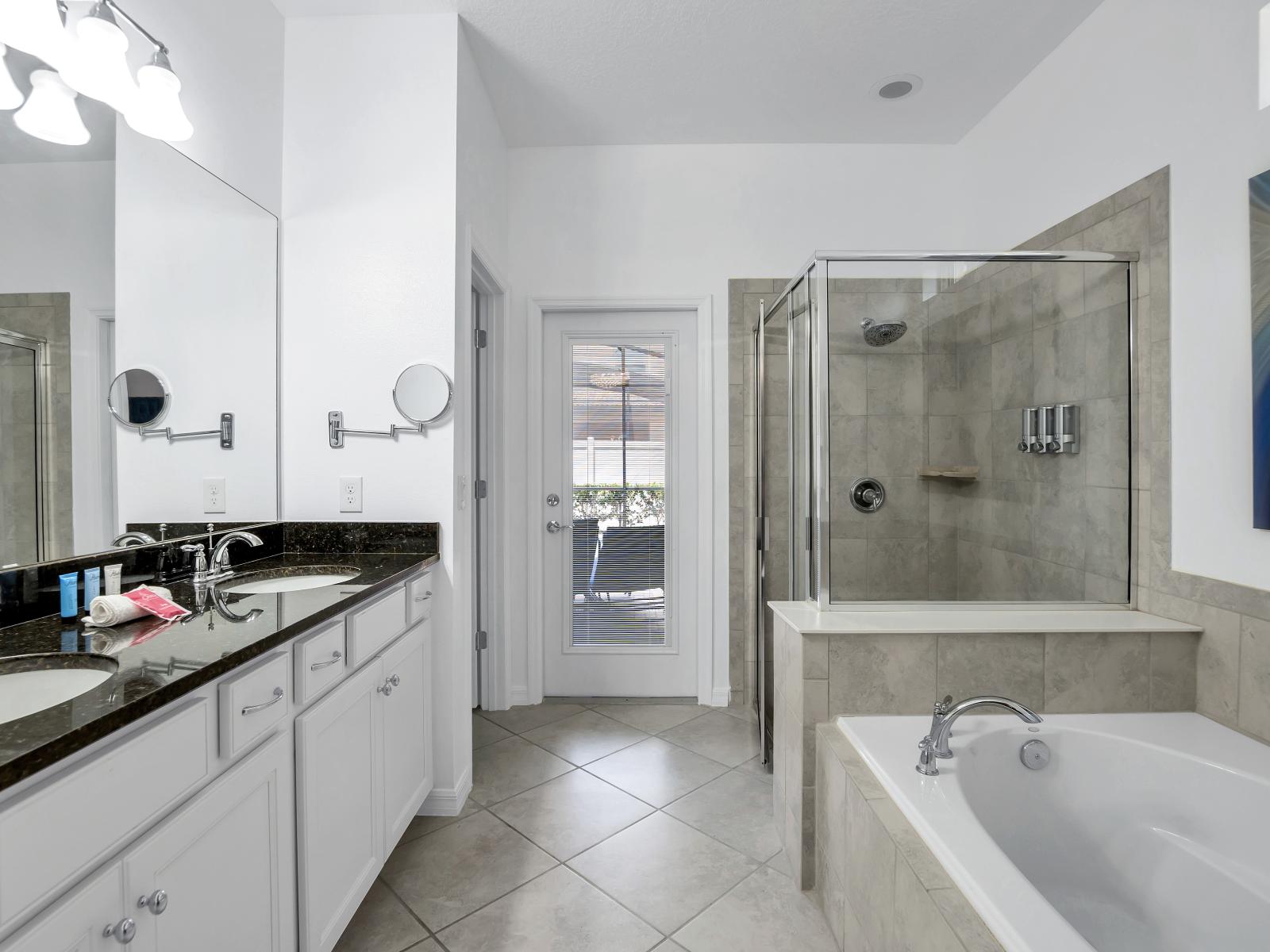 Main bathroom with tub and walk-in shower