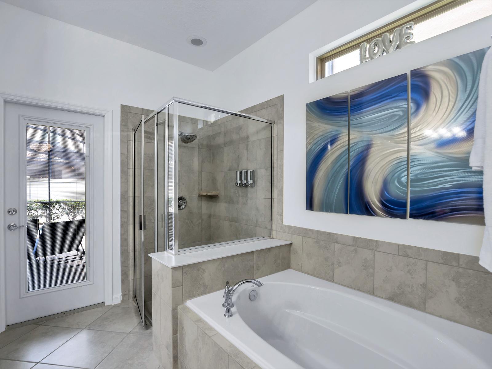 Main bathroom with tub and walk-in shower