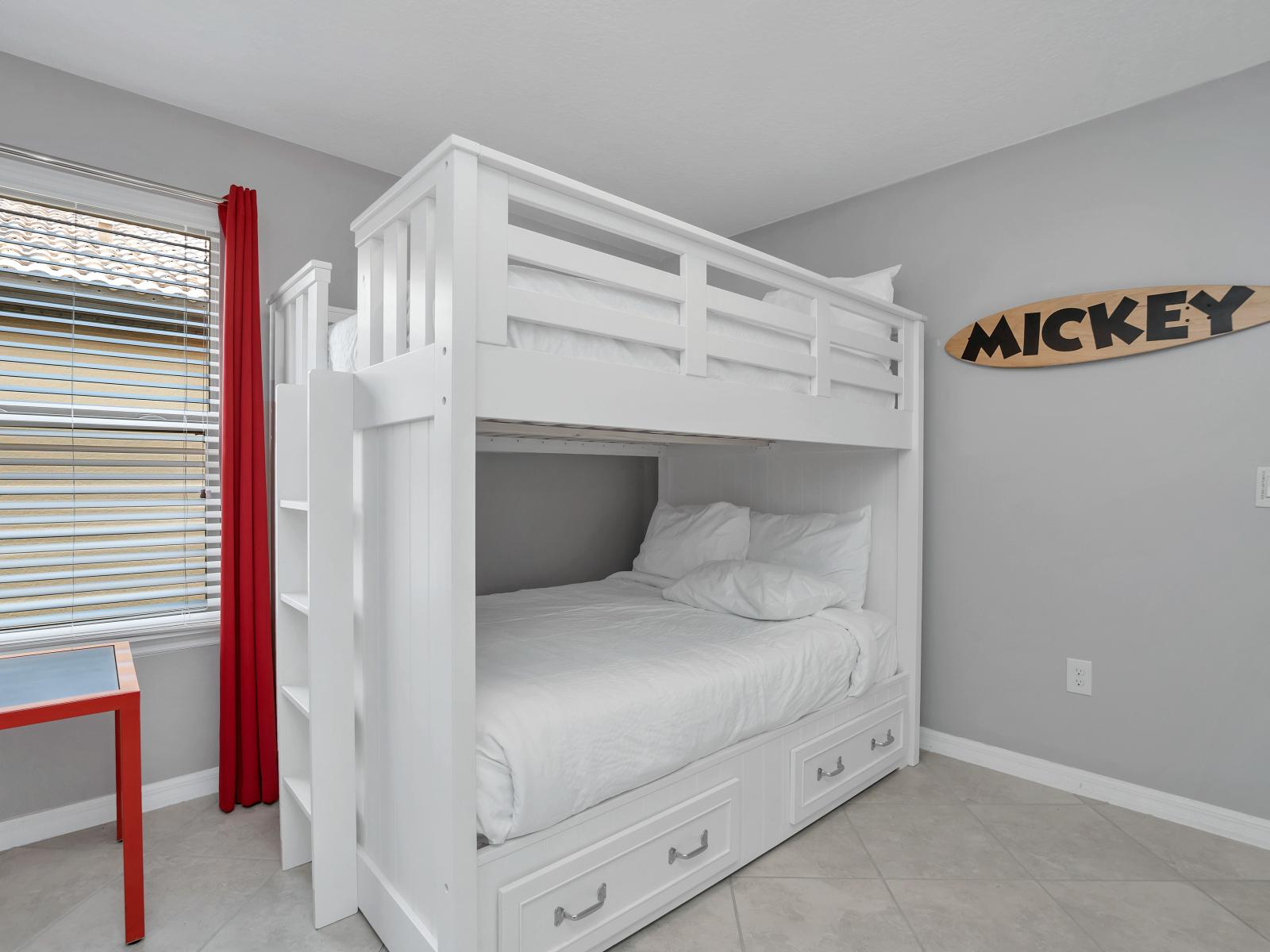 Mickey themed room with double bunk beds