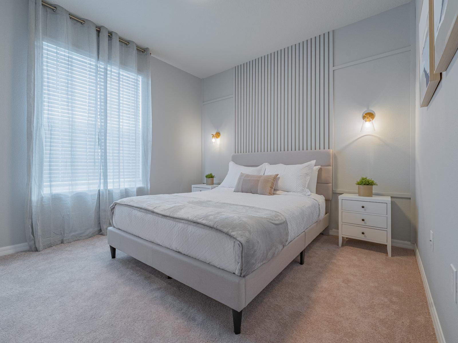 Elegant bedroom of the home in Davenport, Florida - Inviting retreat with a plush bed, ideal for relaxation - Gentle lighting creates a serene atmosphere - Smart TV with access to Netflix for entertainment