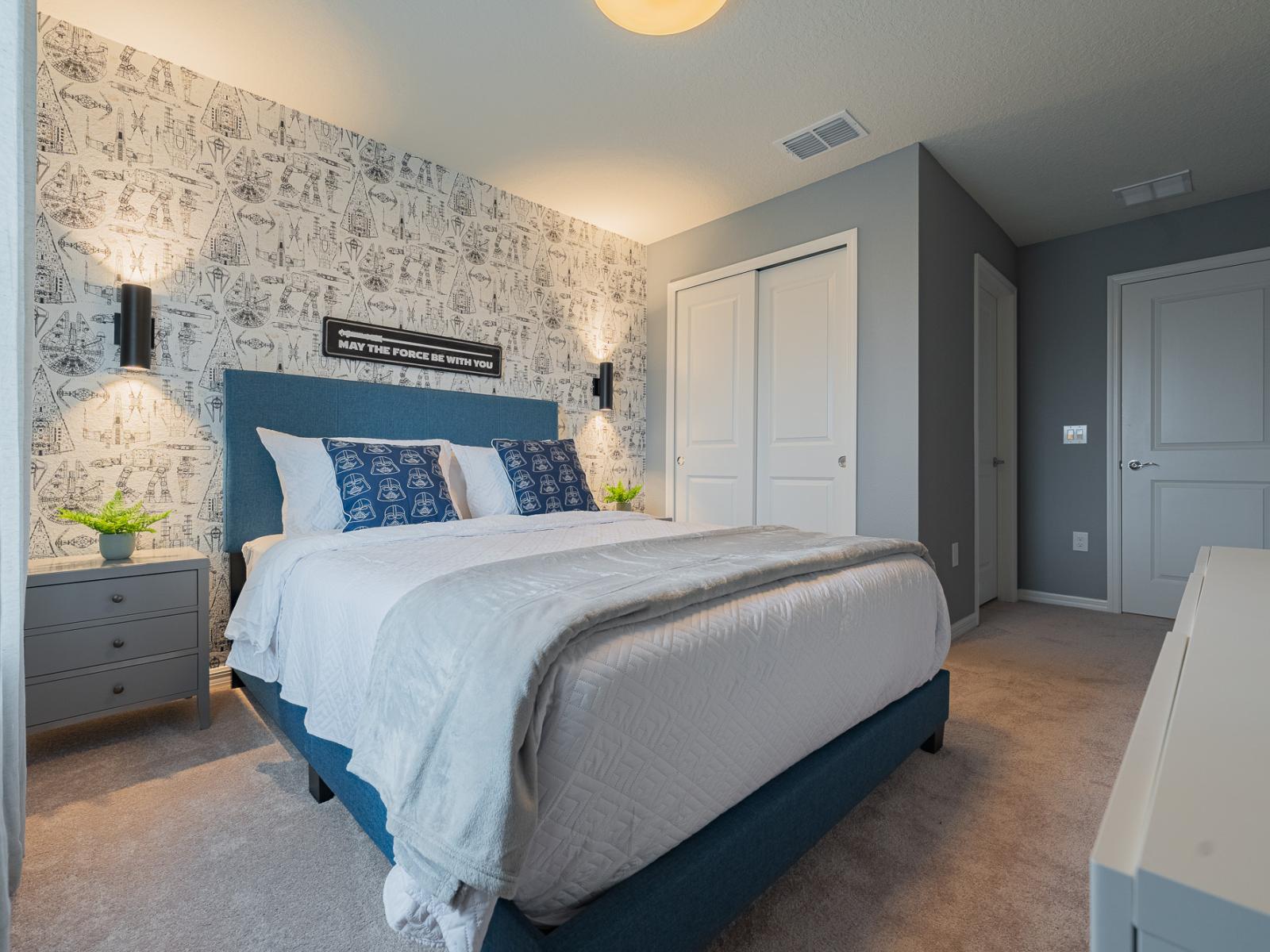 Exquisite bedroom of the home in Davenport, Florida - Luxurious double bed draped in lavish bedding and adorned with soft pillows - Charming side table lamps, evoking an atmosphere of timeless elegance