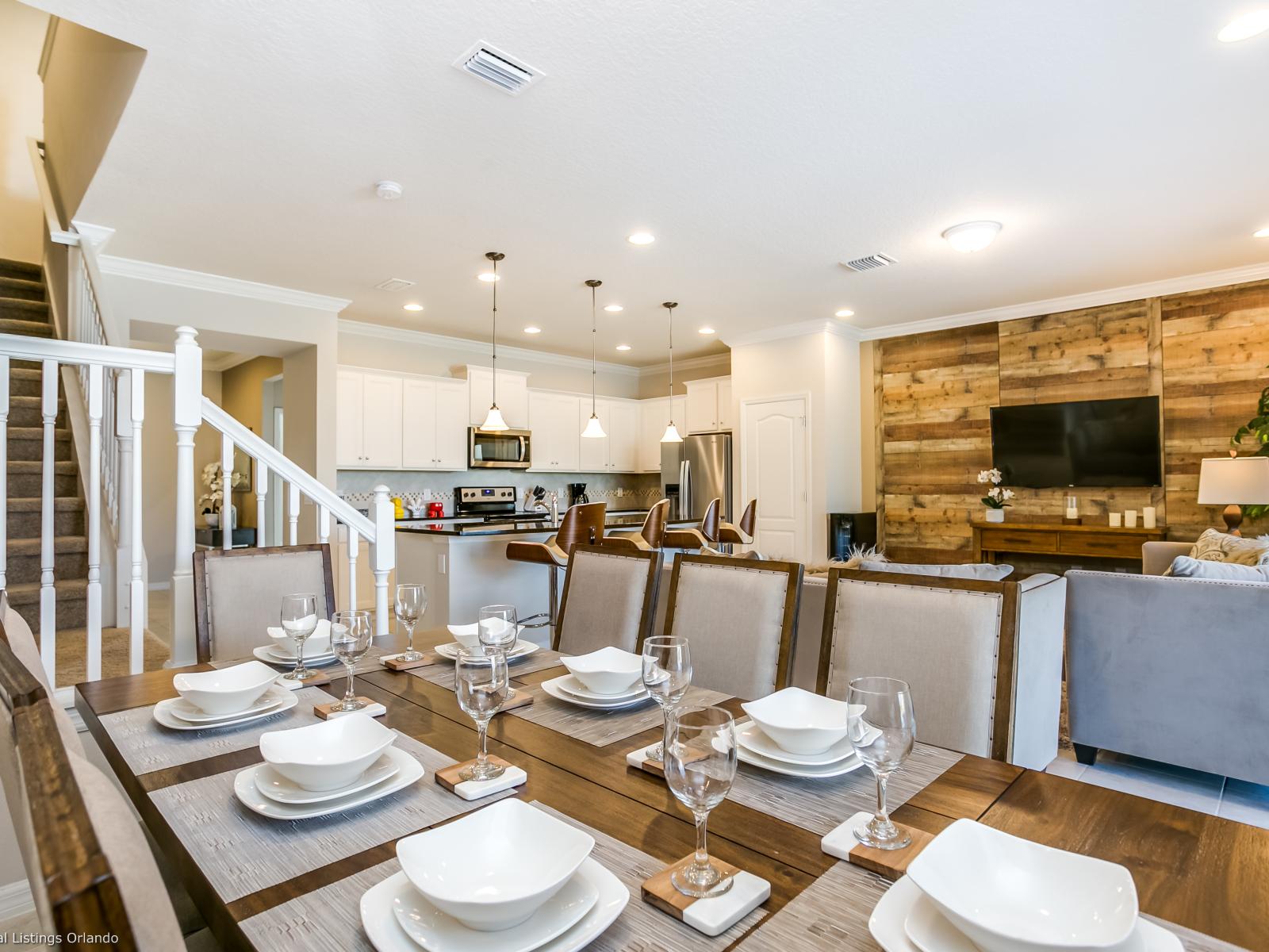 This elegant dining area radiates sophistication, inviting you to indulge in culinary delights amidst refined decor and timeless charm.