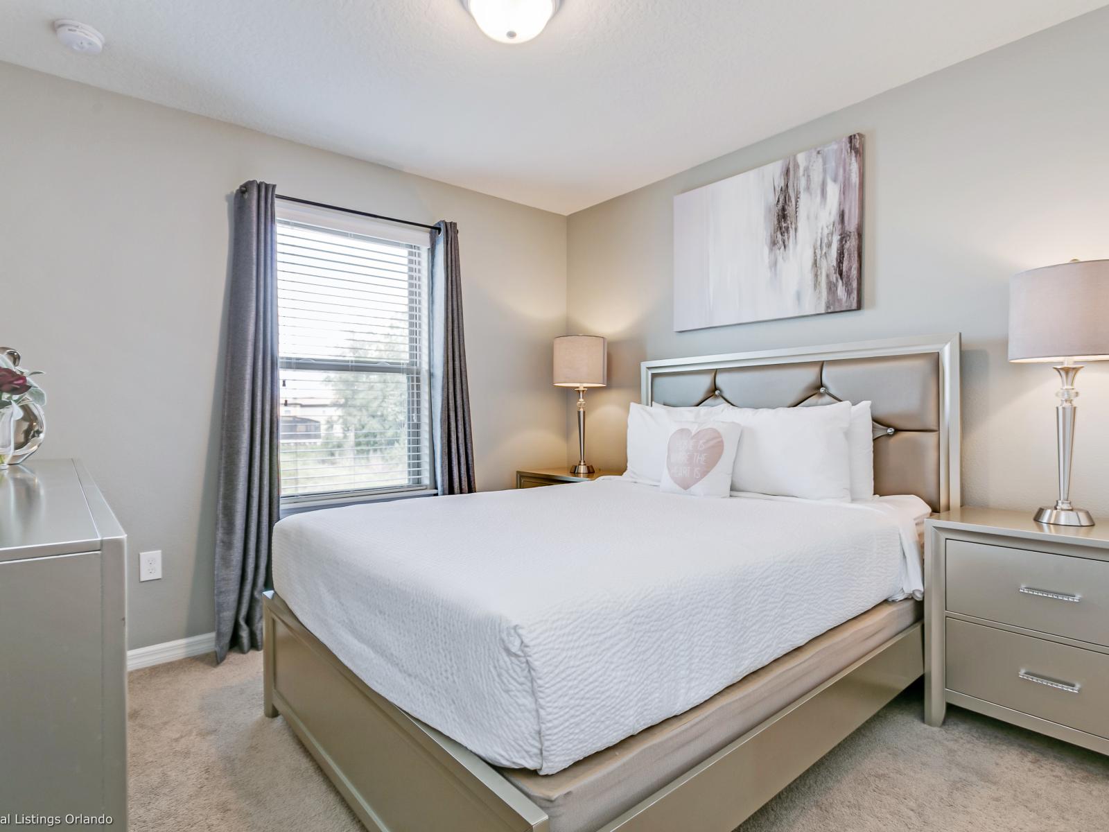 Beautiful bedroom of the townhouse in Kissimmee, Florida - Thoughtfully designed bedroom featuring functional and stylish furniture - Bedroom benefits from abundant natural light, fostering a bright and airy atmosphere.