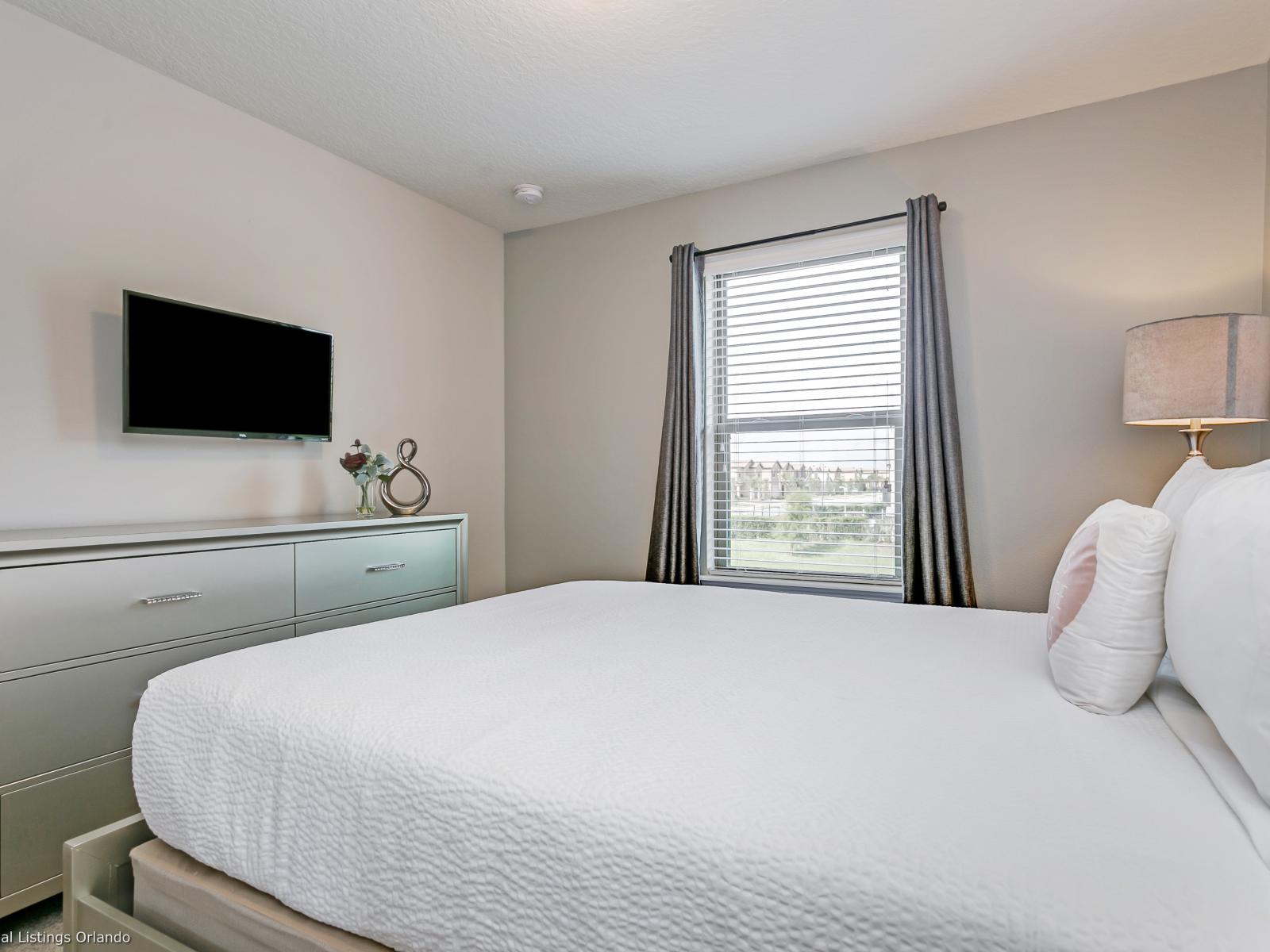 2nd floor bedroom with queen bed