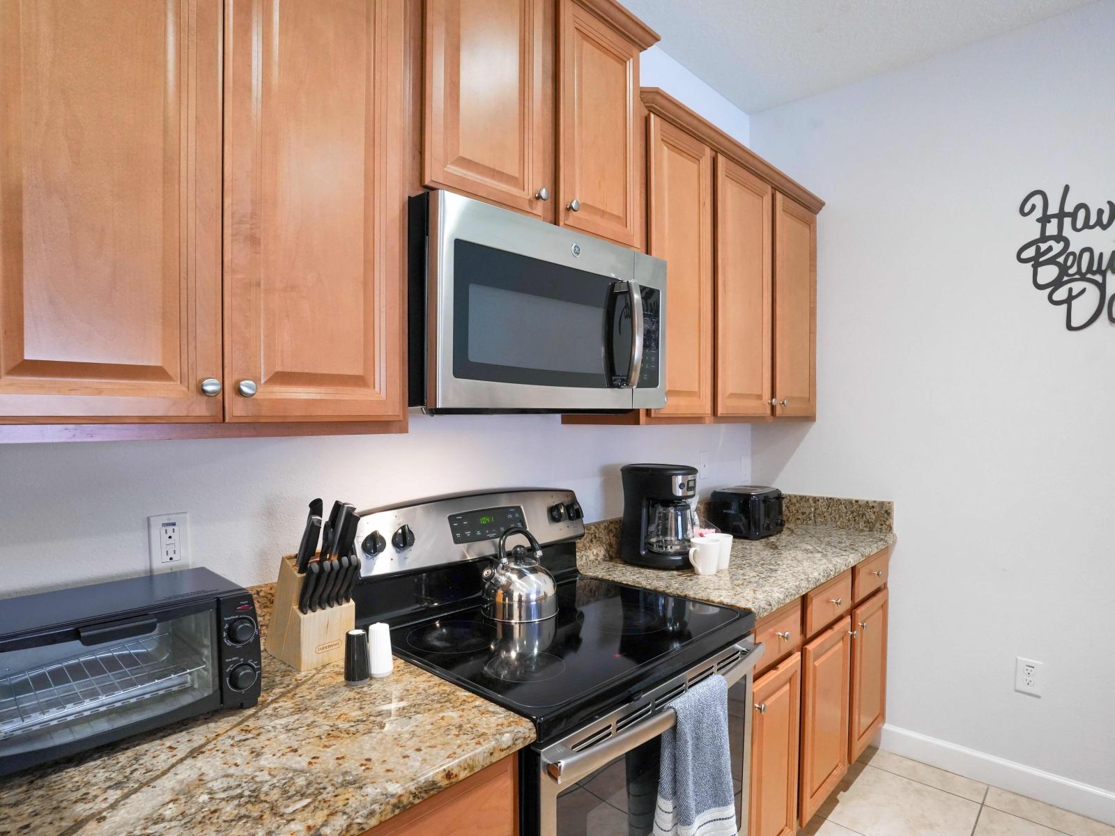 Inviting Kitchen Ambiance: Discover the Charm its wooden Cabinets, Adding a  Character to Your Culinary Haven.