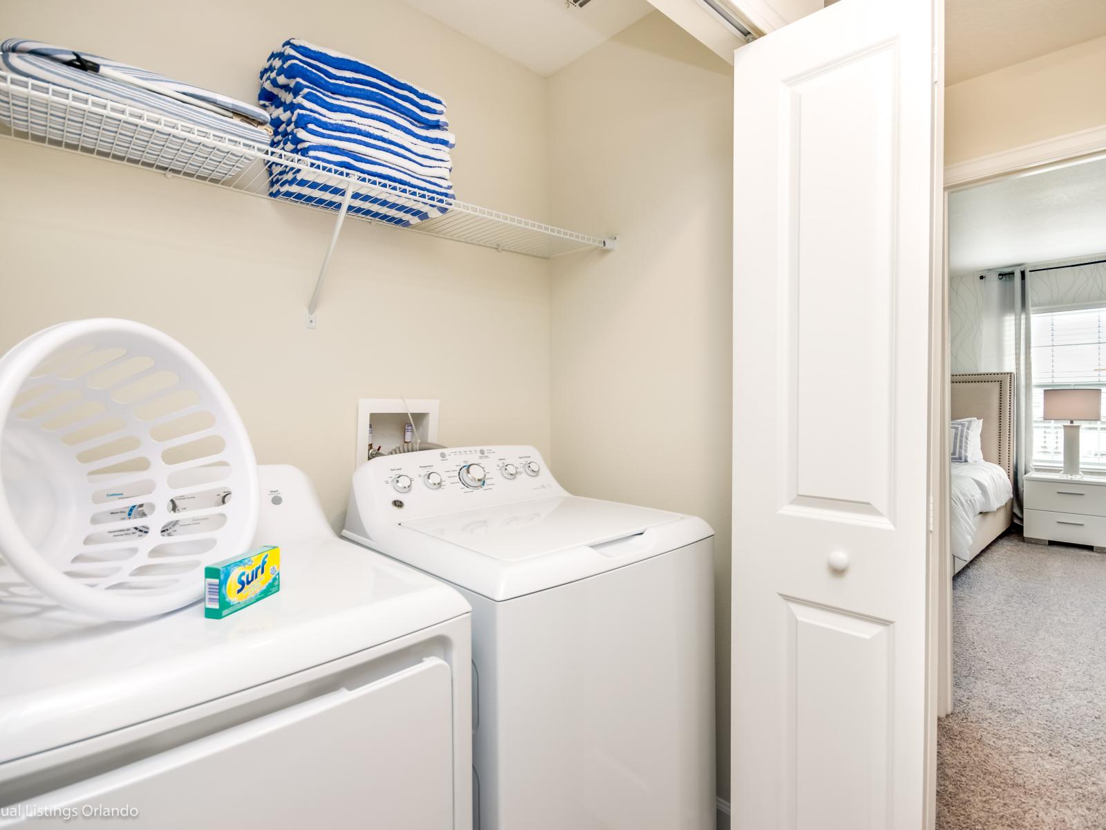 Laundry room with full size washer and dryer