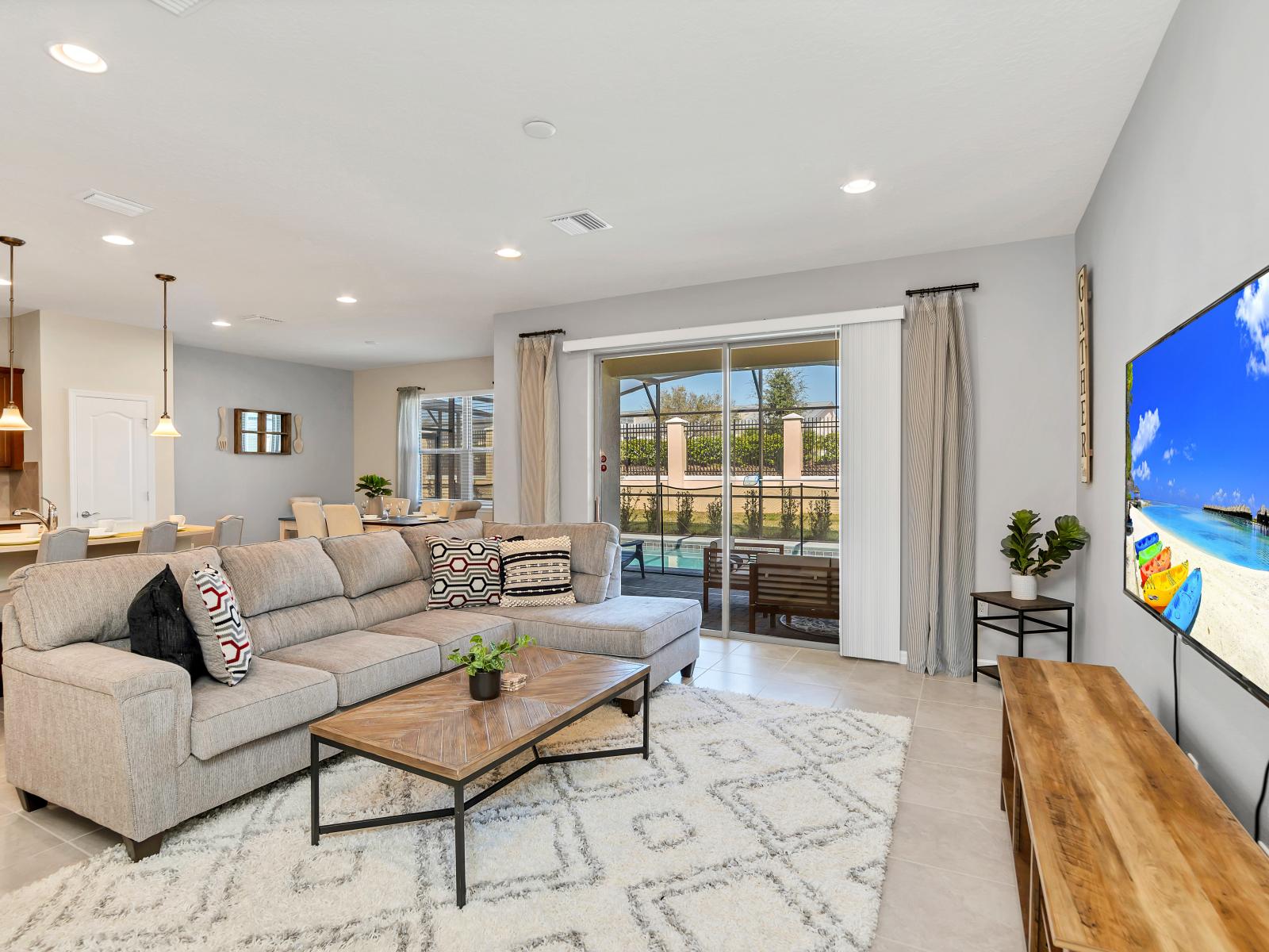 Resplendent Living Area of the Apartment in Reunion Florida - Smart TV and Netflix - Beautiful living room with an open layout, creating a sense of spaciousness - Cozy seating area conducive to relaxation and socializing