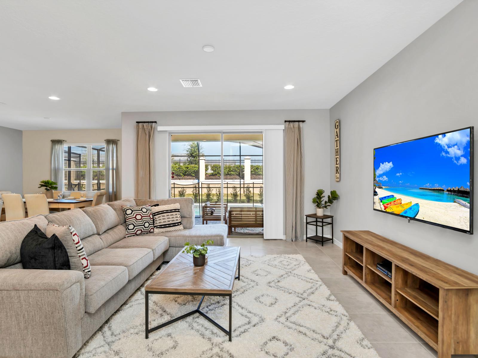 Resplendent Living Area of the Apartment in Reunion Florida - Smart TV and Netflix - Beautiful living room with an open layout, creating a sense of spaciousness - Cozy seating area conducive to relaxation and socializing