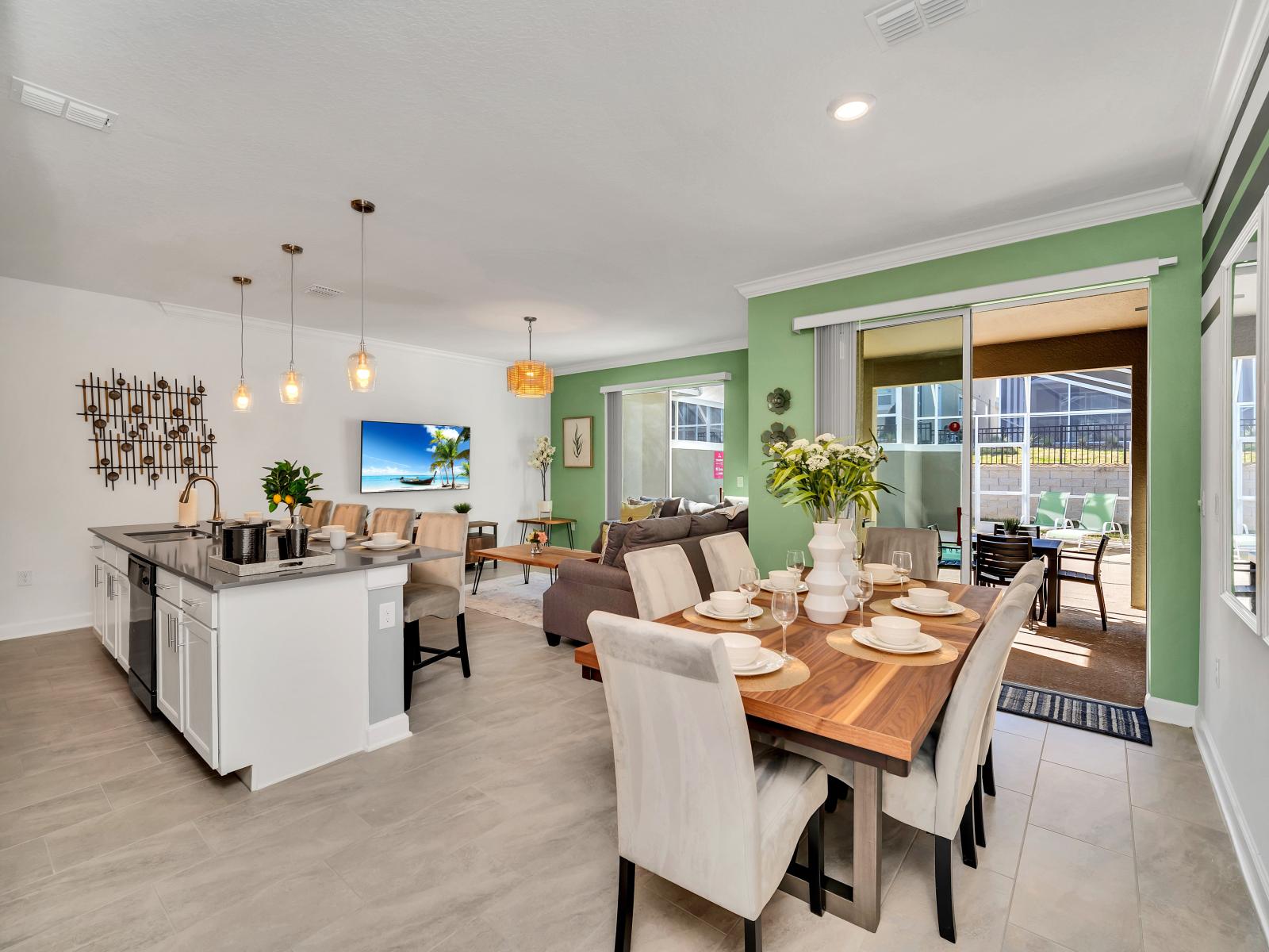 The dining area- has  clean lines, contemporary furnishings, and stylish accents, it provides a sophisticated setting for guests to enjoy delicious meals and memorable conversations during their stay.