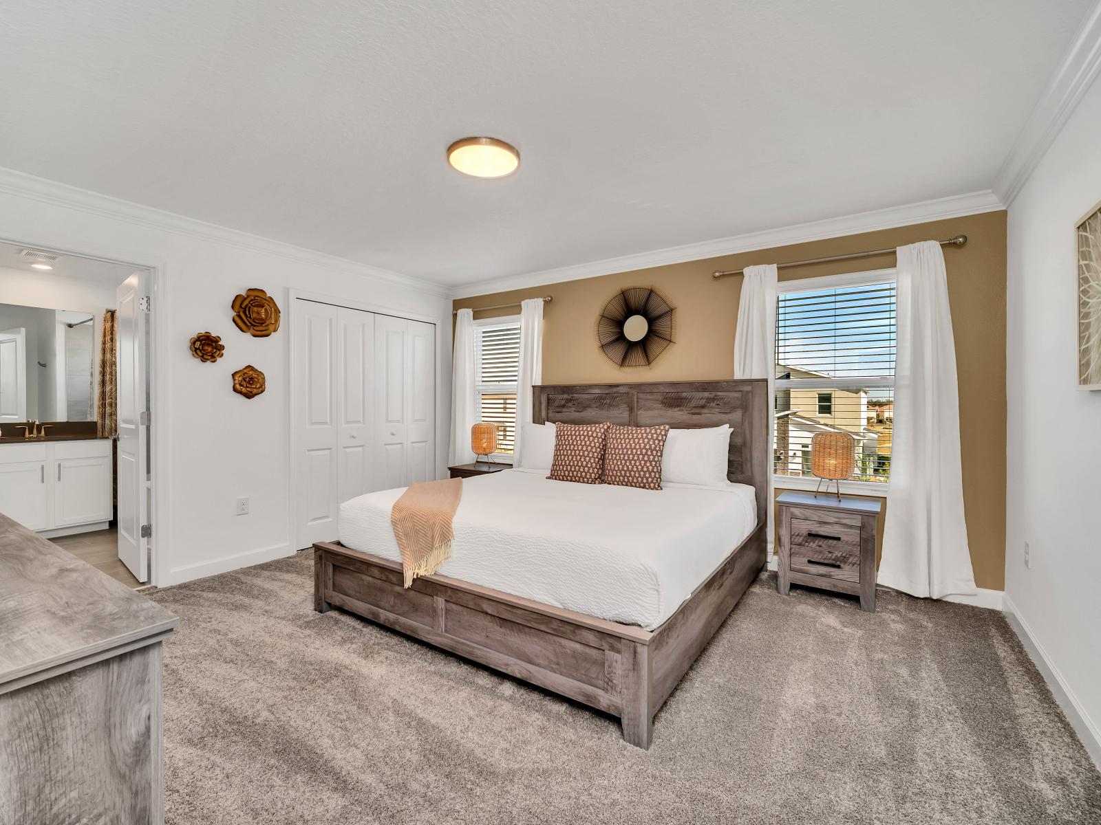 The bedroom's  uncluttered spaces, crisp linens, and modern furnishings, it offers guests a serene retreat for rest and relaxation during their stay.