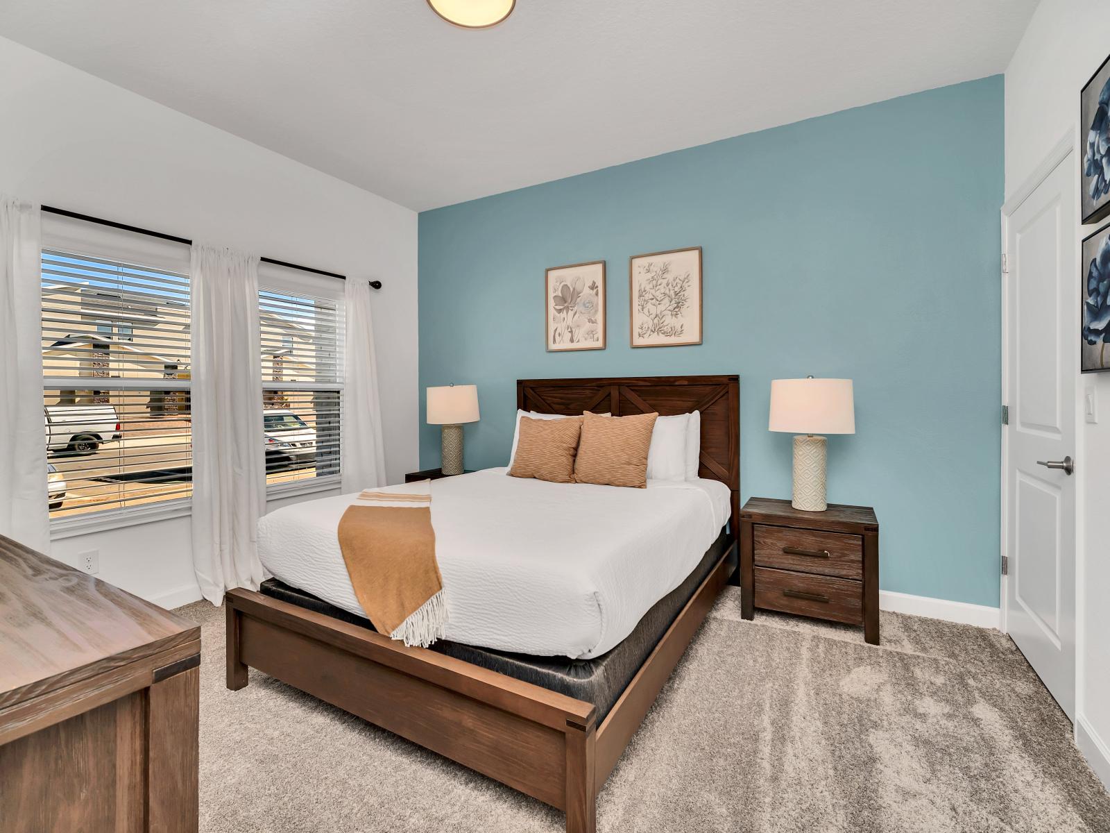 The bedroom offers a tranquil retreat for guests to unwind and recharge. With its comfortable furnishings, soothing ambiance, and thoughtful design, it provides a peaceful haven where guests can relax and enjoy a restful night's sleep.