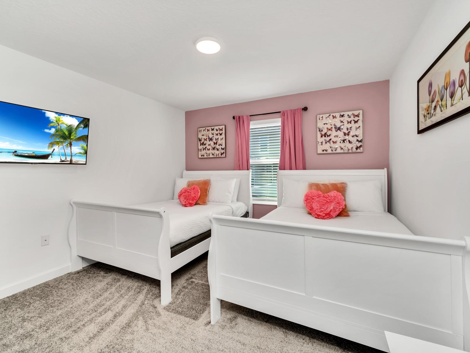 This bedroom is a charming retreat designed with a feminine touch. With soft colors, elegant decor, and delicate accents, it offers a cozy and inviting space where guests can feel pampered and relaxed during their stay.