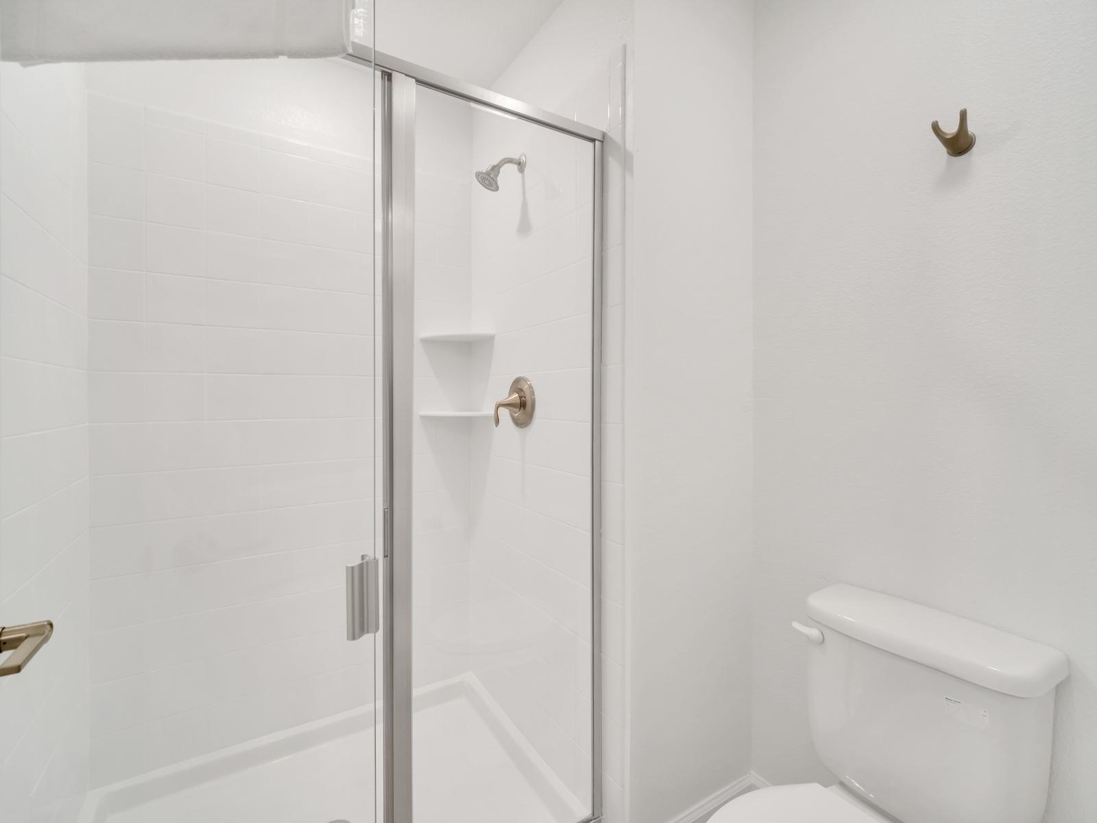 The shower room offers guests a modern and stylish bathing experience.