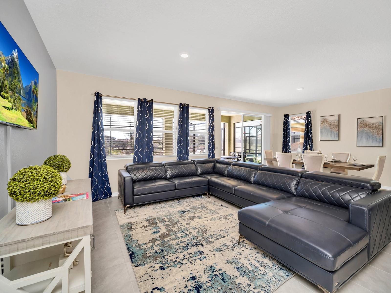 Captivating living area  of the home in Florida - Beautiful living room with an open layout, creating a sense of spaciousness - Stylish furniture providing comfort and a cohesive look - Cozy seating area conducive to relaxation and socializing