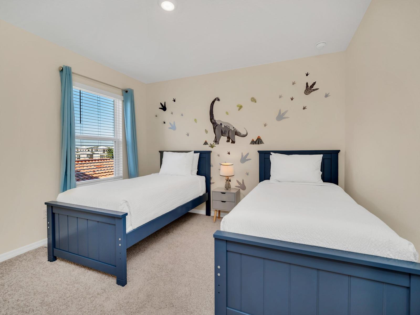 Calming bedroom of the home in Florida - Offers 2 single beds - Thoughtfully designed for comfort and style - Plush bedding and pillows for a luxurious feel