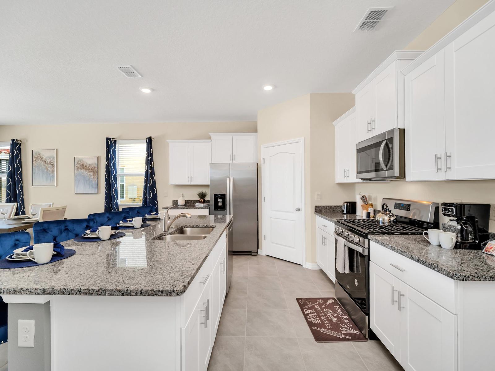 Open Elegance: Our townhouse kitchen is a visual delight, offering a spacious open concept that encourages a seamless flow between cooking and socializing