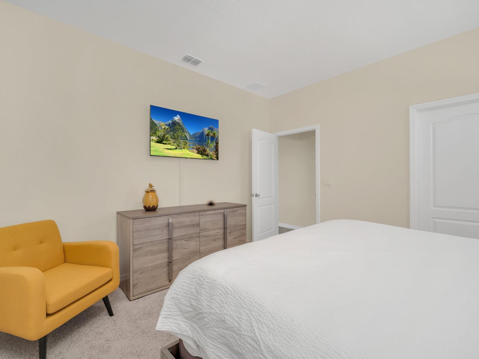 Enjoy a cozy and happy place  in this clean and spotless bedroom.