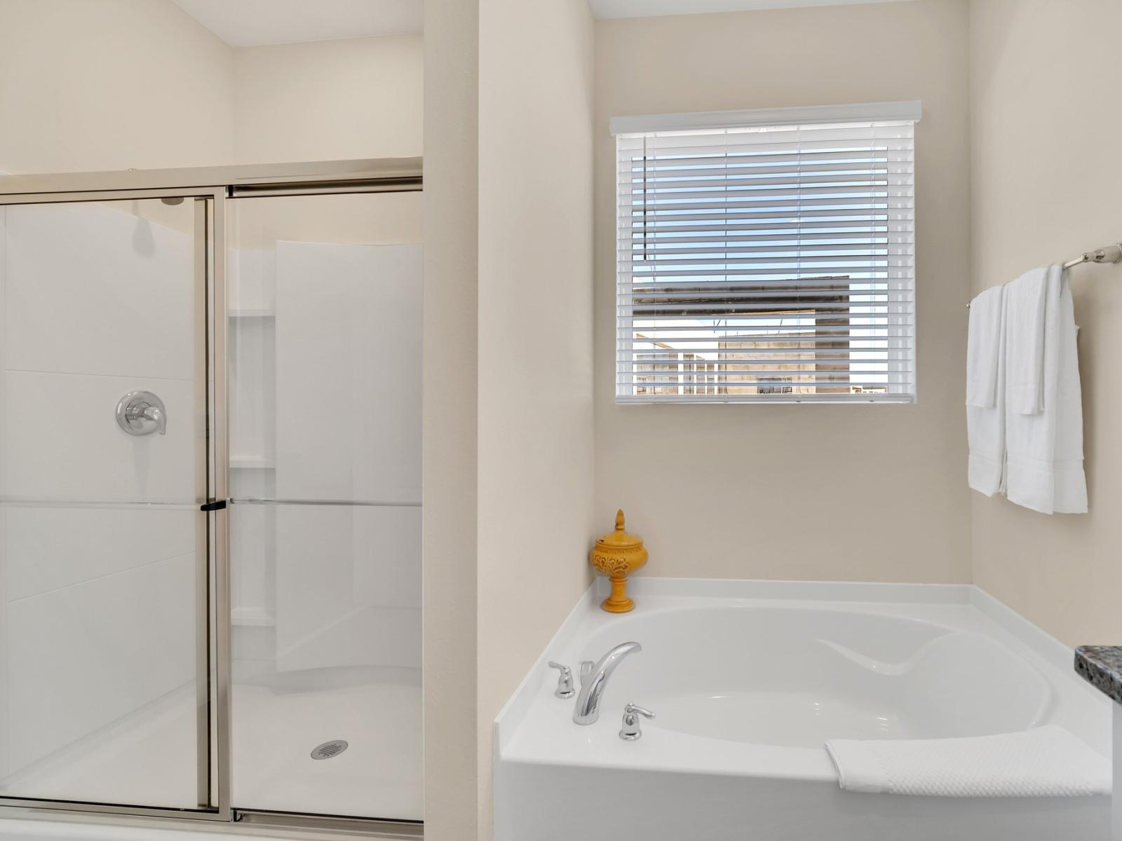 Transform bath time into a luxurious and relaxing experience with this spacious contemporary bathroom.