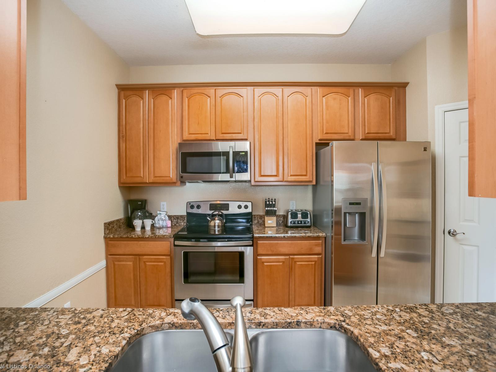 Experience the joy of cooking in the fully equipped kitchen , where modern appliances and ample space await to inspire culinary adventures and delightful dining experiences for guests to savor.