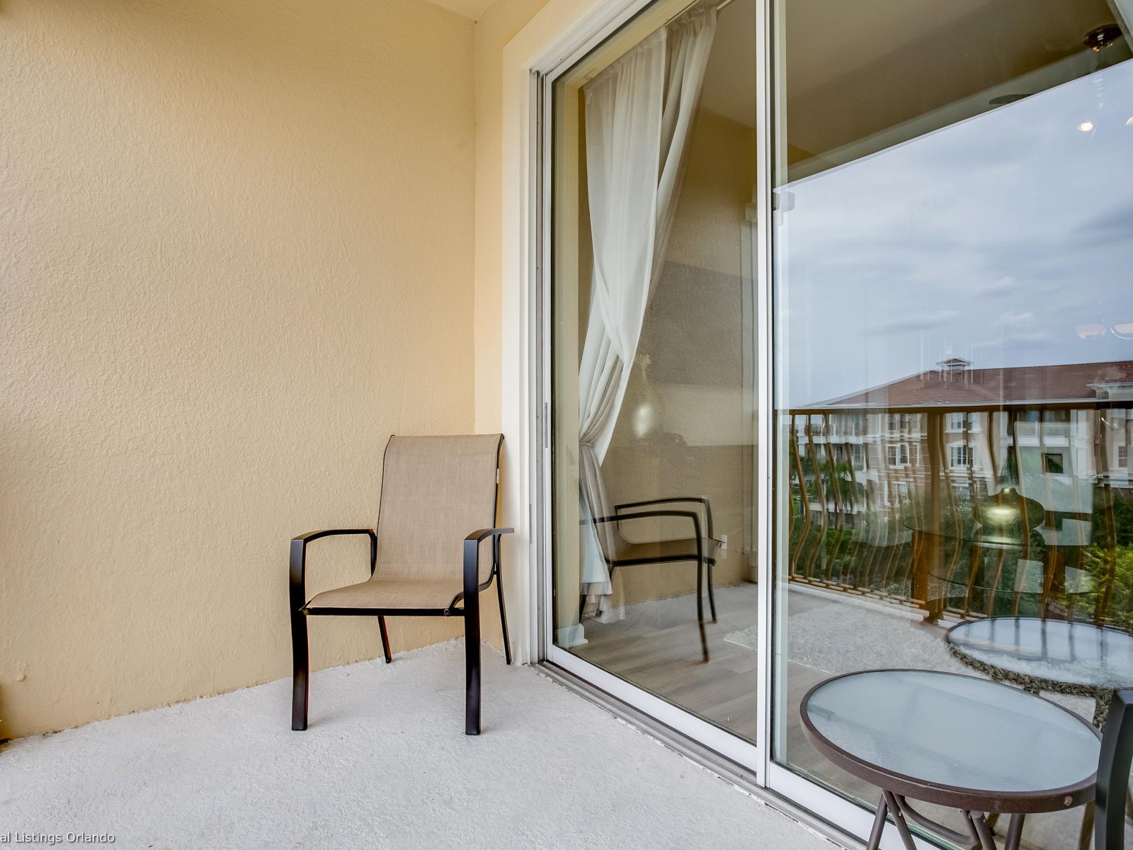 Step out onto this balcony and immerse yourself in the vibrant atmosphere of Vista Cay Resort.