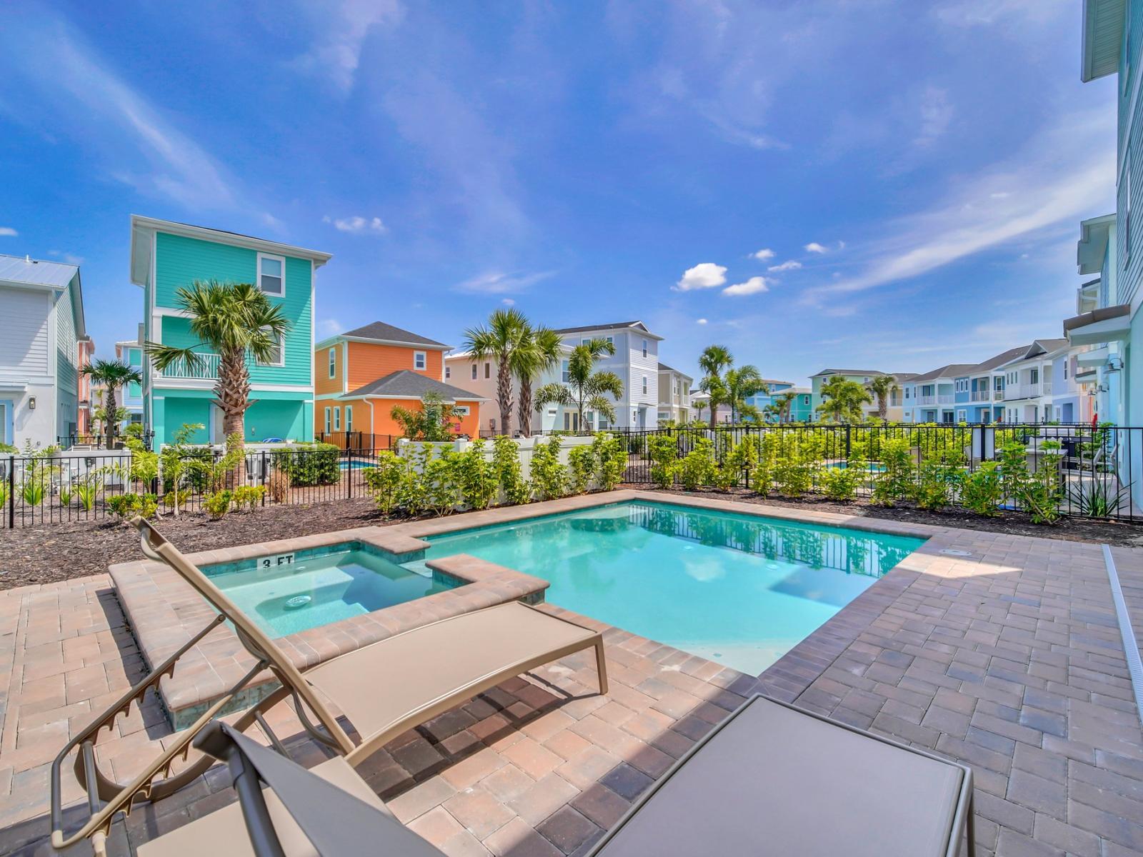 - Stunning private pool of the cottage in Reunion Florida - Dive into a refreshing poolside escape - Lounge in tranquility by the sparkling waters - Inviting pool area for a perfect getaway