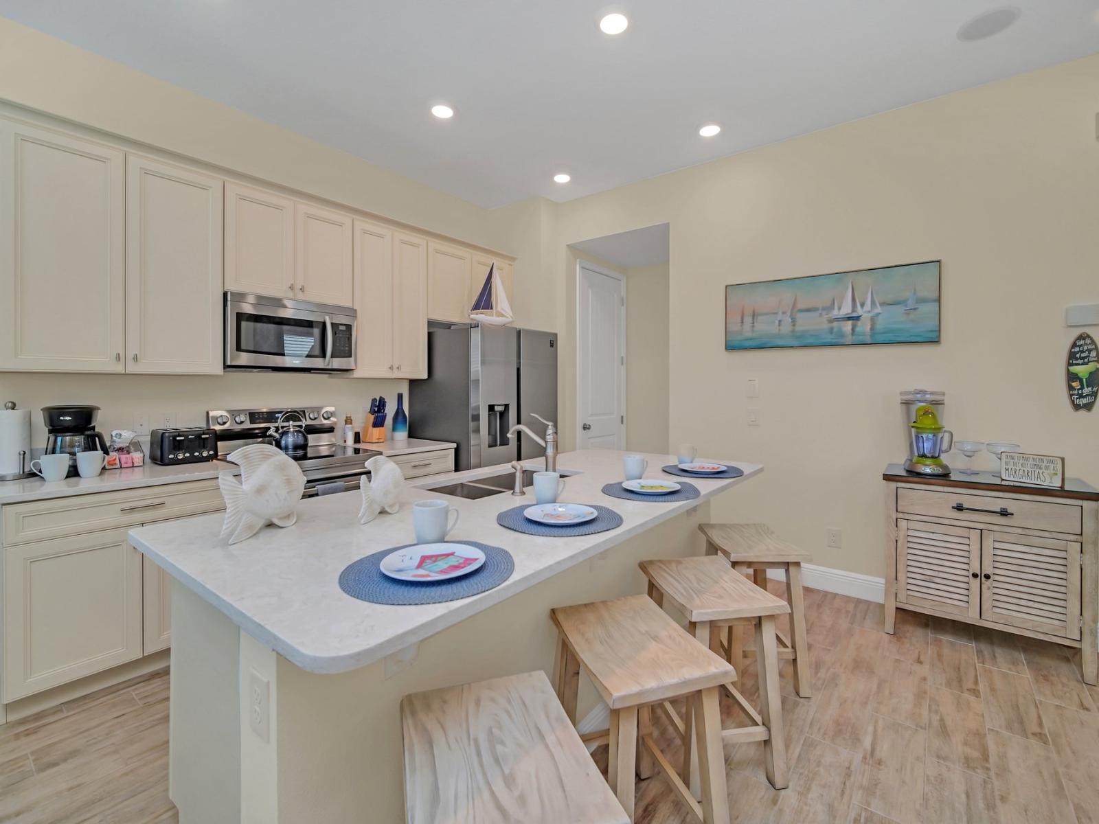 - Kitchen of the cottage in Reunion Florida - Smart use of space with versatile storage solutions - Contemporary design with clean lines and minimalist aesthetics - A kitchen that seamlessly combines style, functionality, and convenience