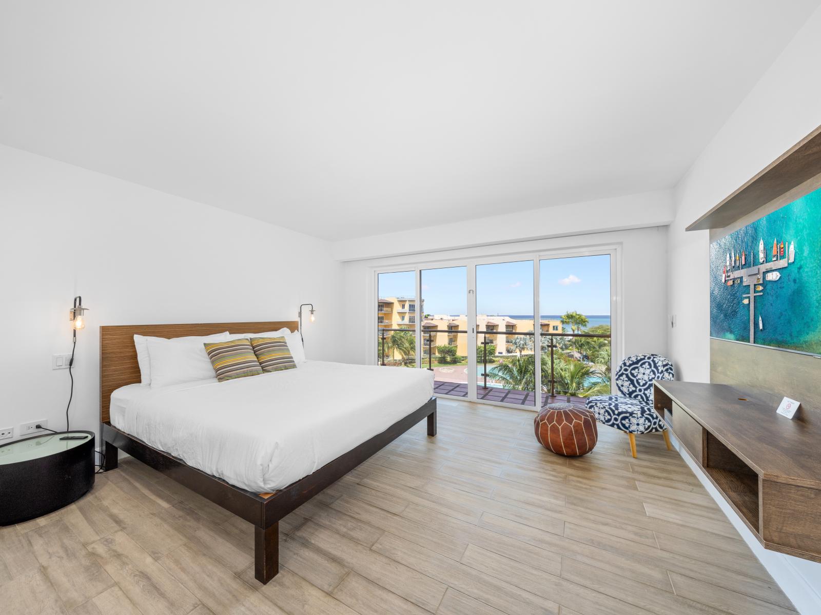 Grandiloquent bedroom of the condo in Aruba with ocean views - Private Balcony with pleasant atmosphere