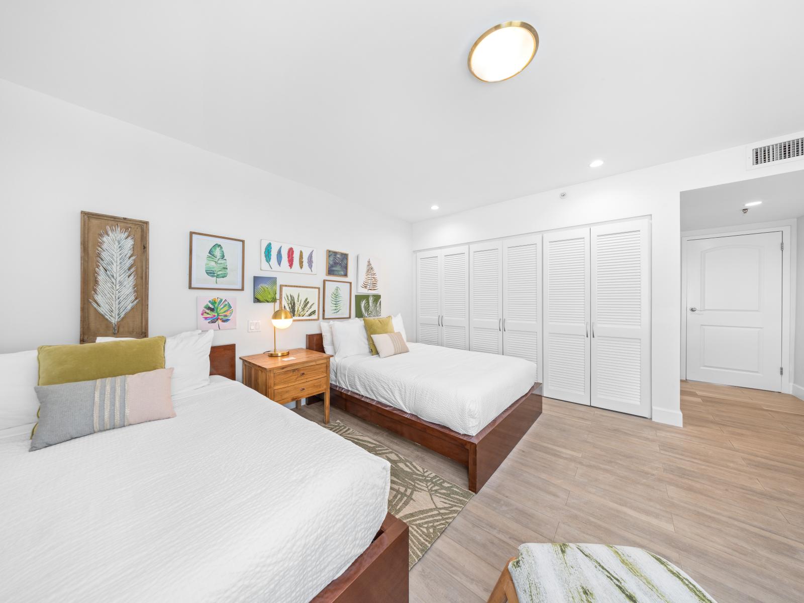 Discover cozy accommodations in Bedroom 2, complete with two full-sized beds and entertainment options with a TV. Rest easy and recharge for another day of adventure.